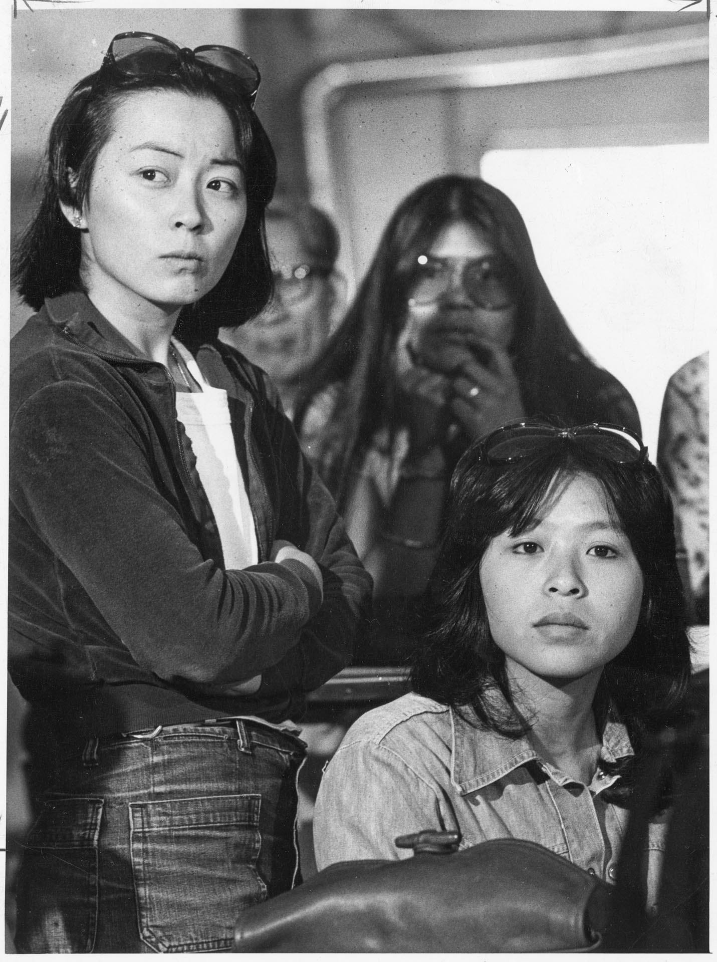 Image of Elaine Ko and Shari Woo of the International District Housing Alliance at a meeting, July 18, 1977