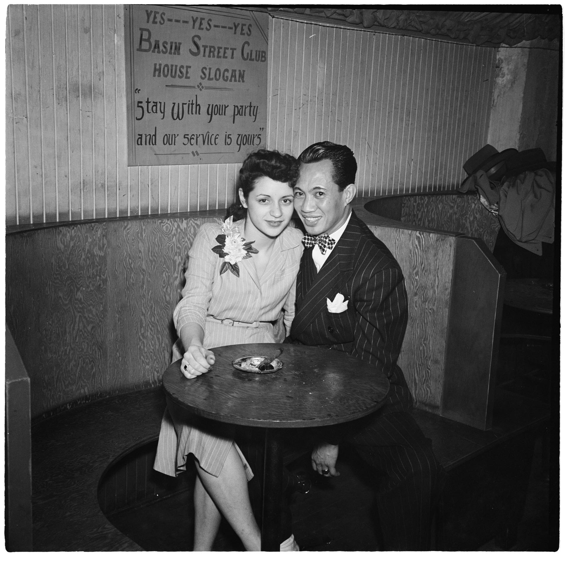 Image of Couple sitting in booth at the Basin Street nightclub, Seattle, December 1, 1945