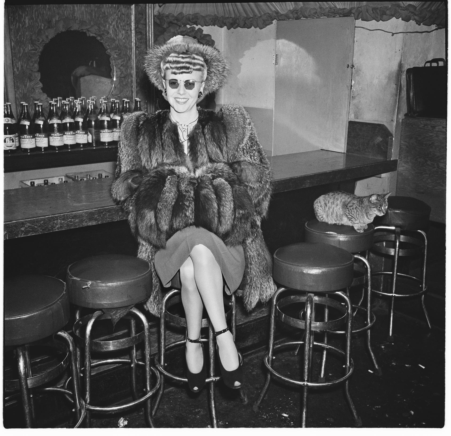Image of Woman wearing a fur coat at the Basin Street nightclub, Seattle, 1946