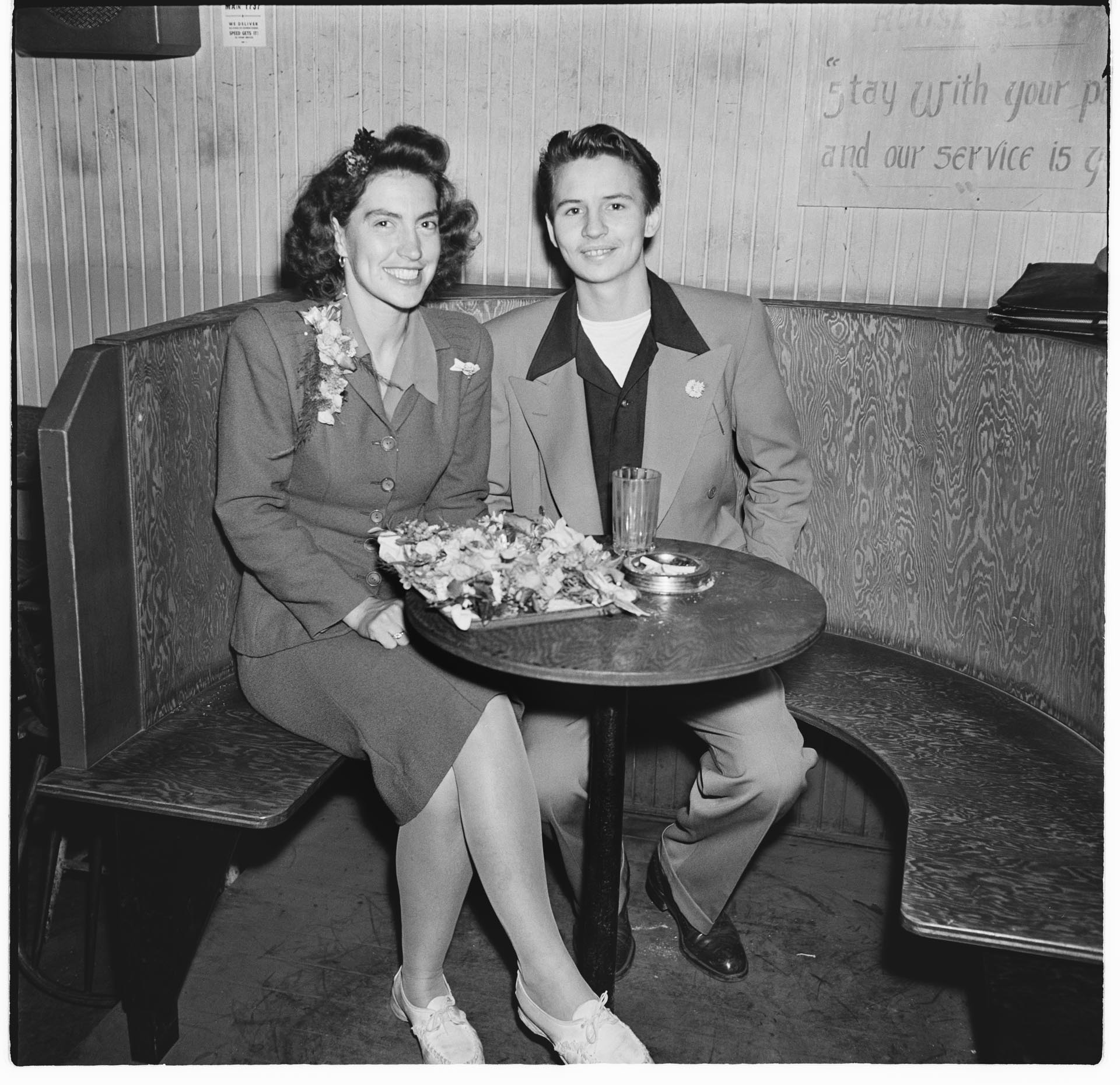 Image of Couple sitting in booth at Basin Street nightclub, Seattle, September 1945