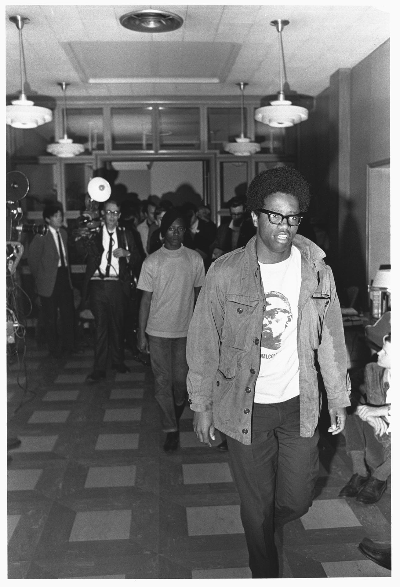 Image of Larry Gossett leading students at BSU UW protest, May 20, 1968