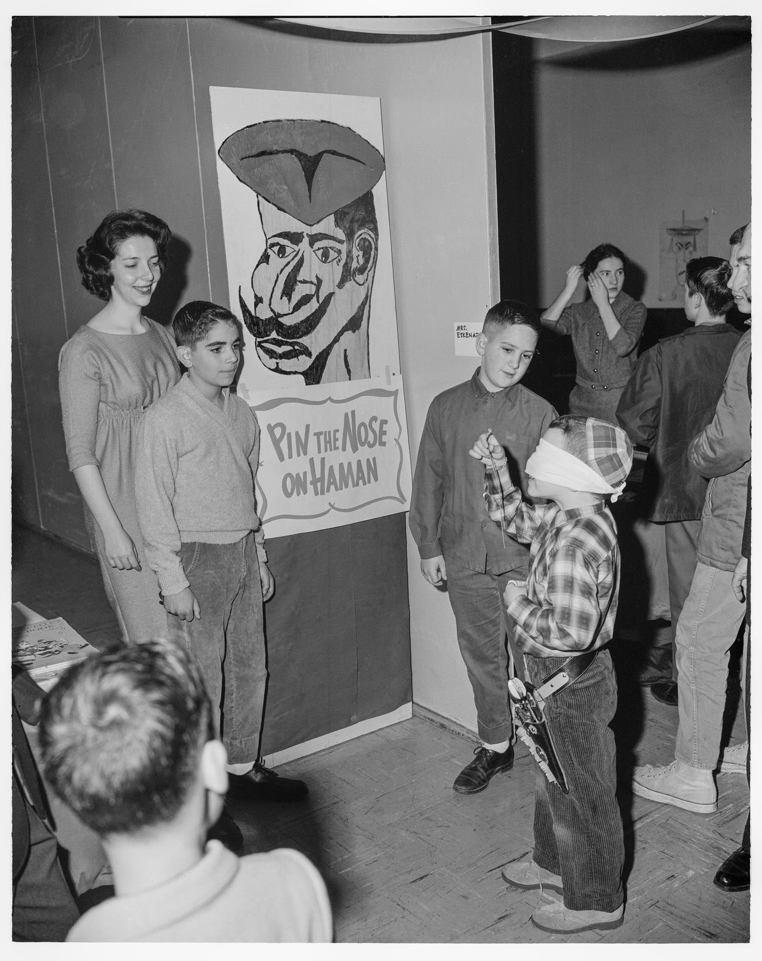 Image of Children playing games at Purim carnival, Congregation Herzl, Seattle, March 18, 1962