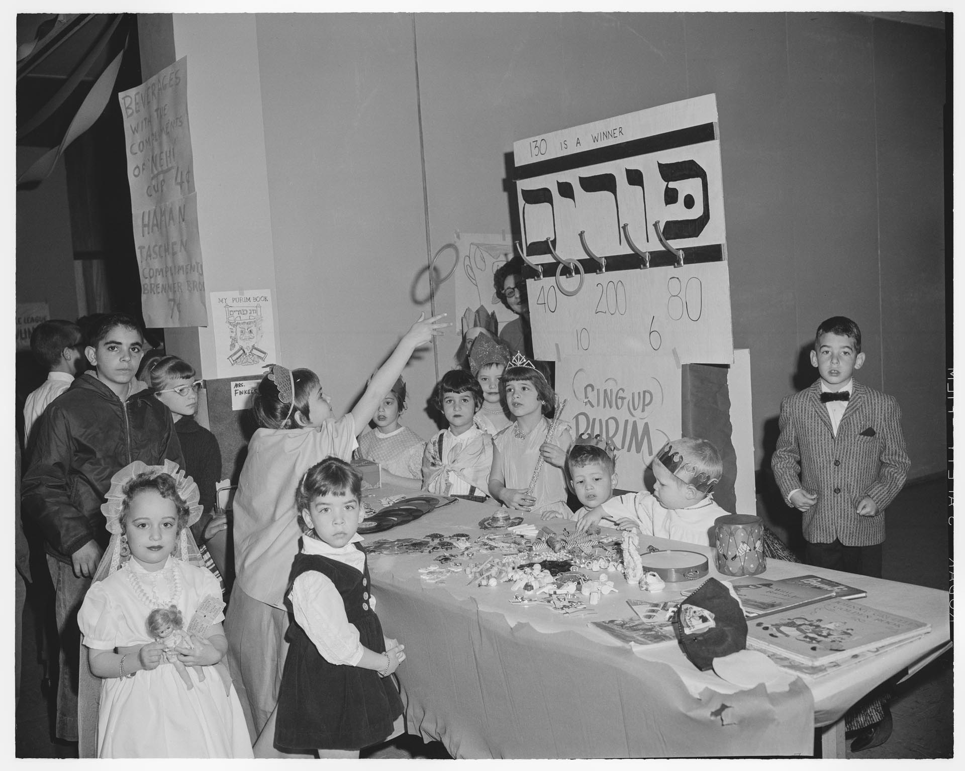 Image of Children playing games at Purim carnival, Congregation Herzl, Seattle, March 18, 1962