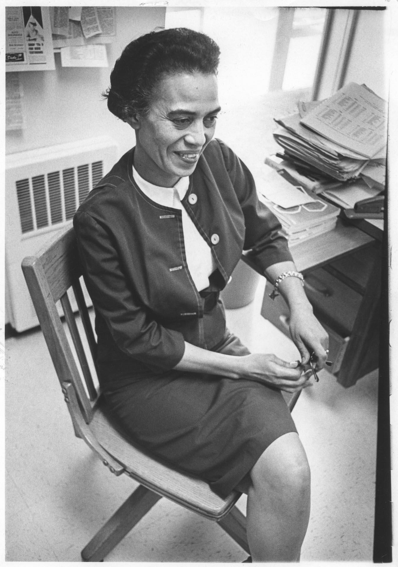 Image of Roberta Byrd Barr sitting at desk, May 4, 1967