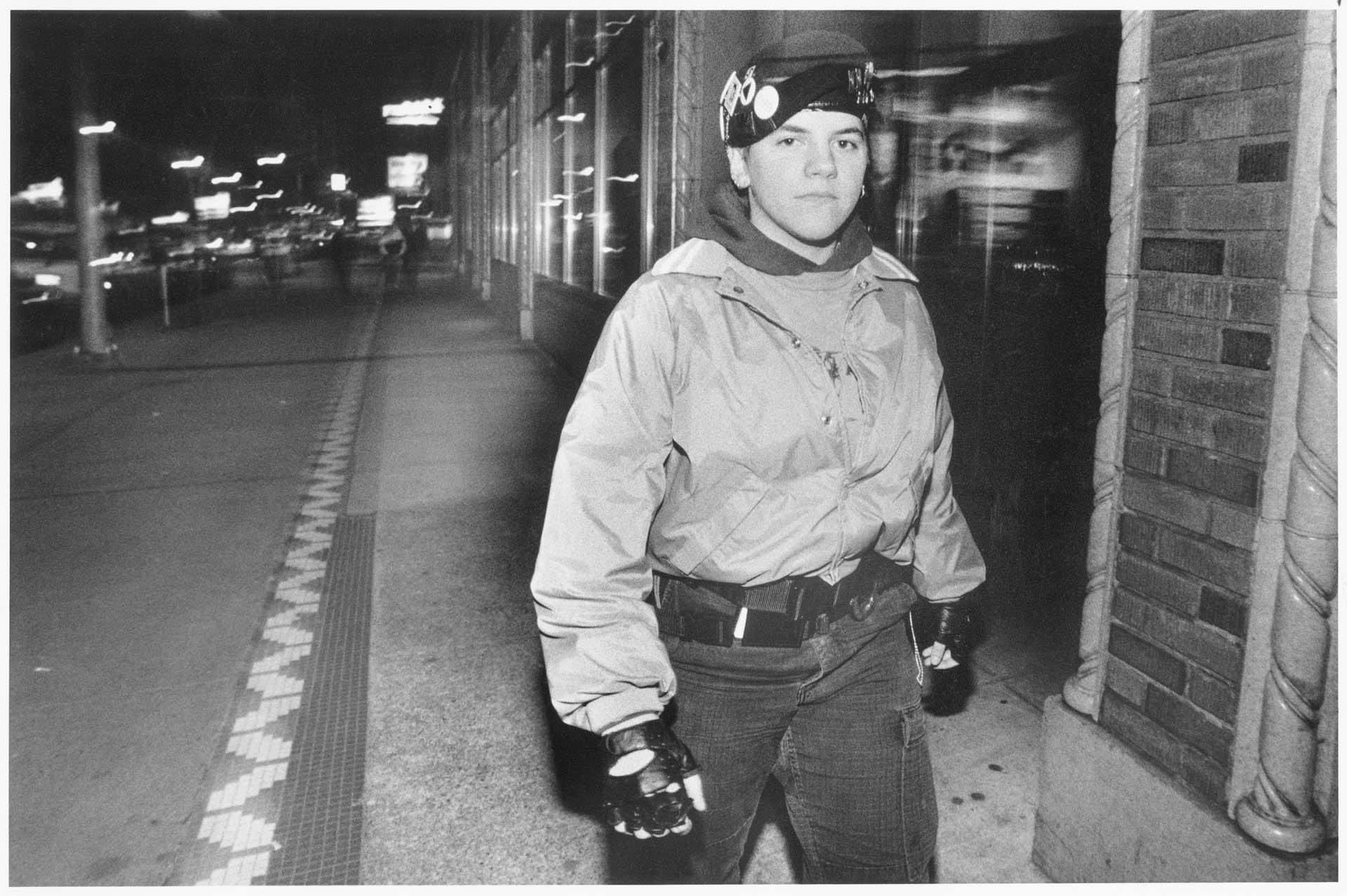 Image of Alex Cleghorn of Q Patrol walking in Capitol Hill, Seattle, January 17, 1992