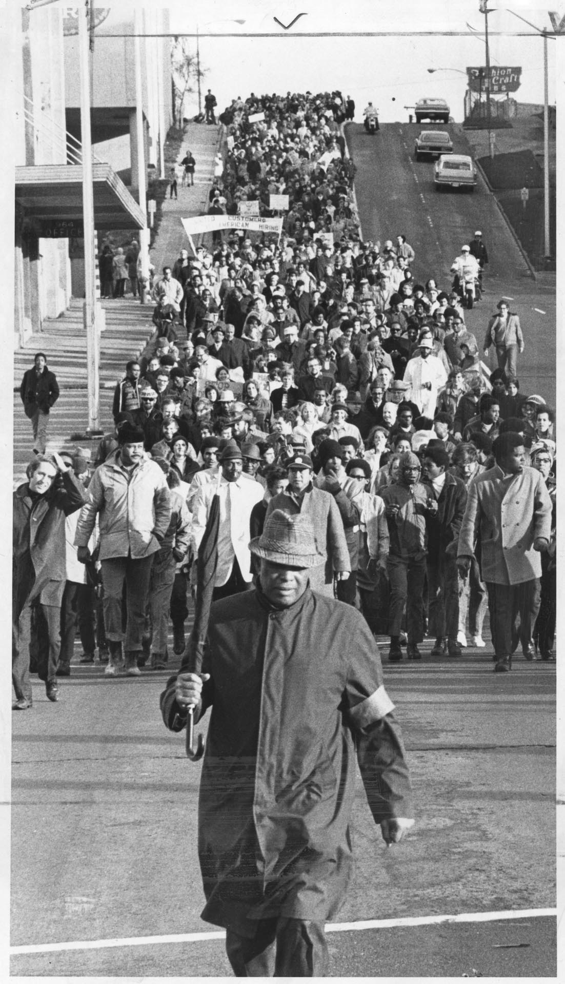 Image of Marchers on Denny Way protesting lack of jobs for minorities, Seattle, December 14, 1969