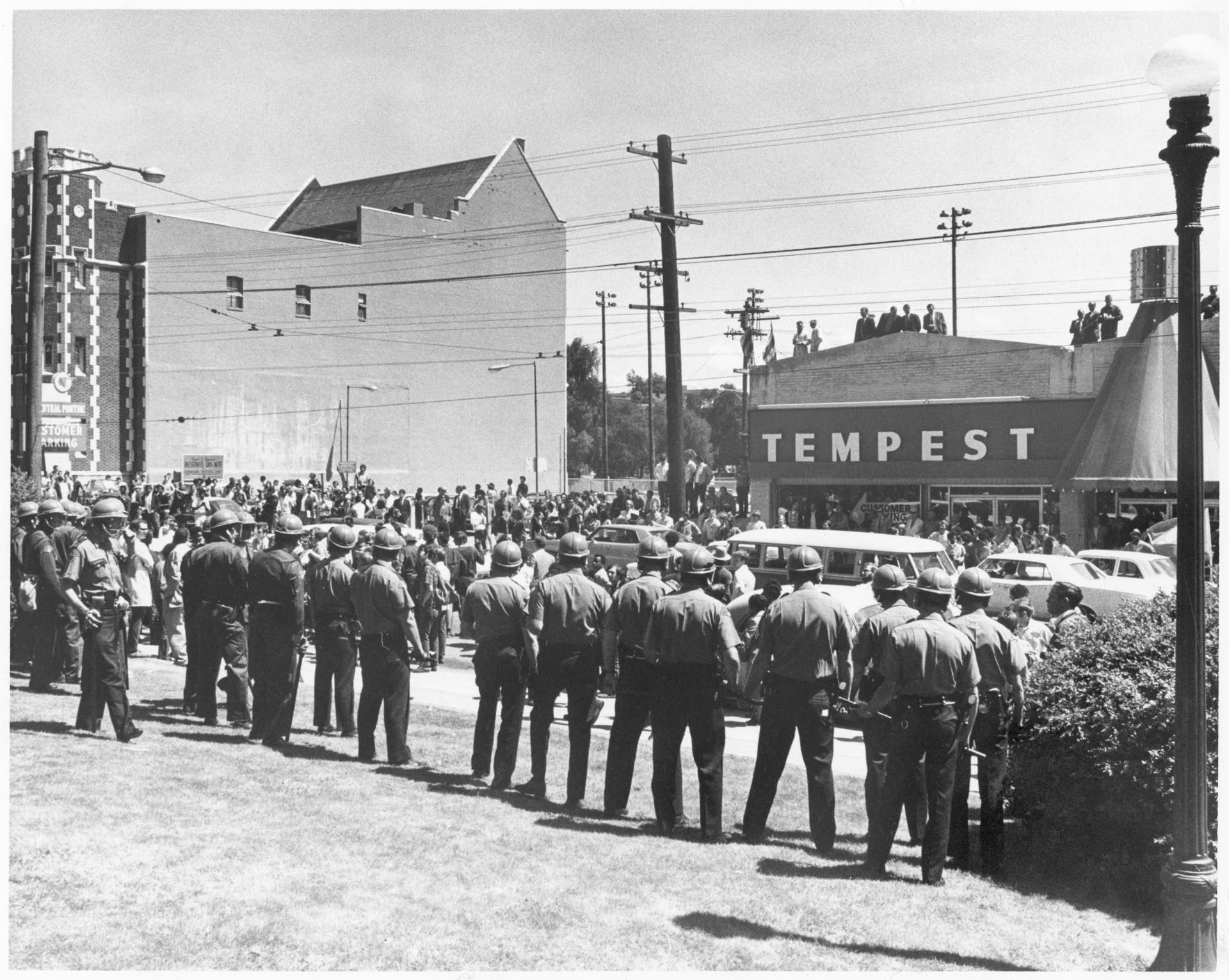 Image of Police line and protesters at Edison South, Seattle, Seattle, May 23, 1969