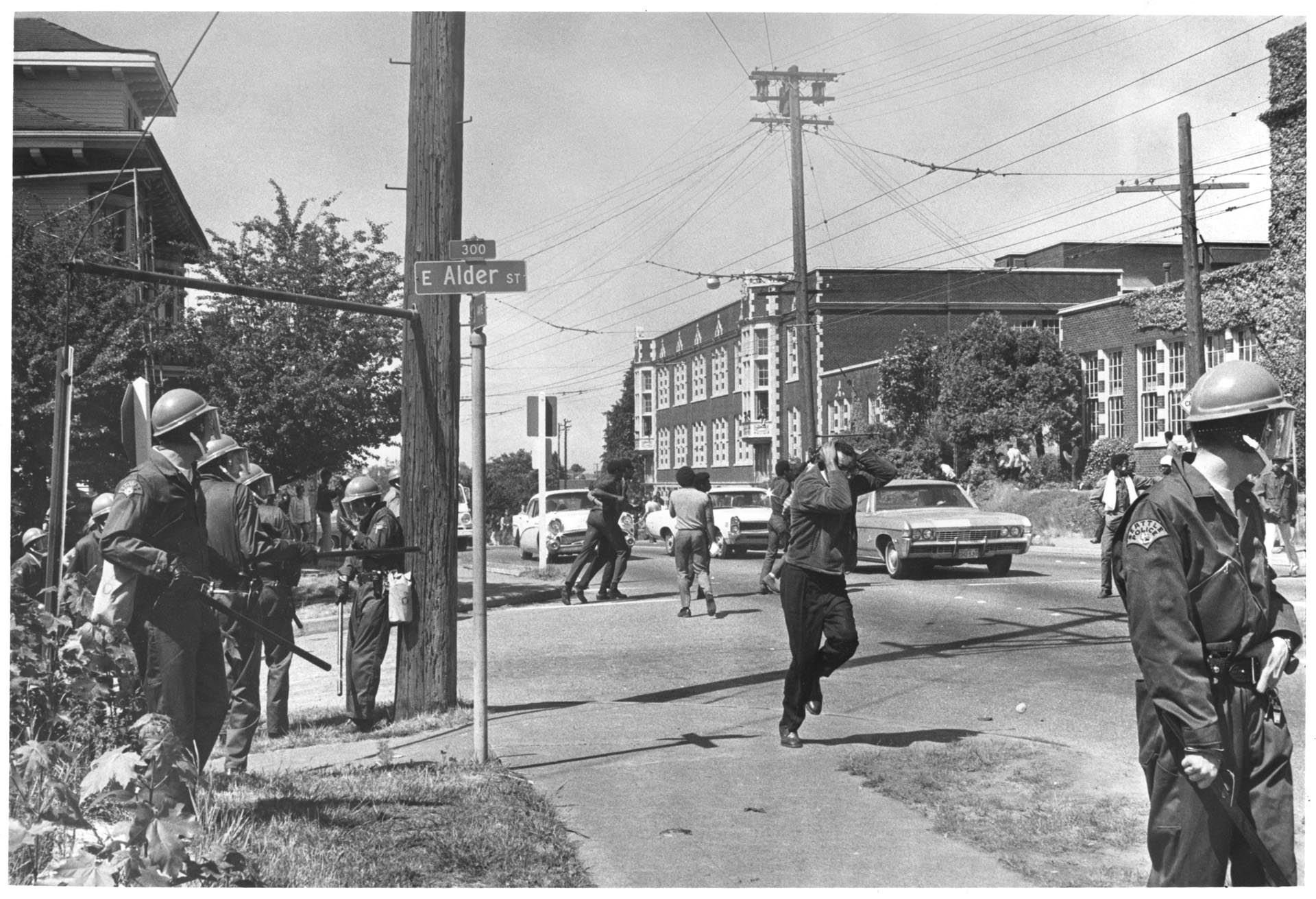 Image of Protesters and police at 23rd Avenue S. and S. Alder Street, Seattle, May 26, 1969