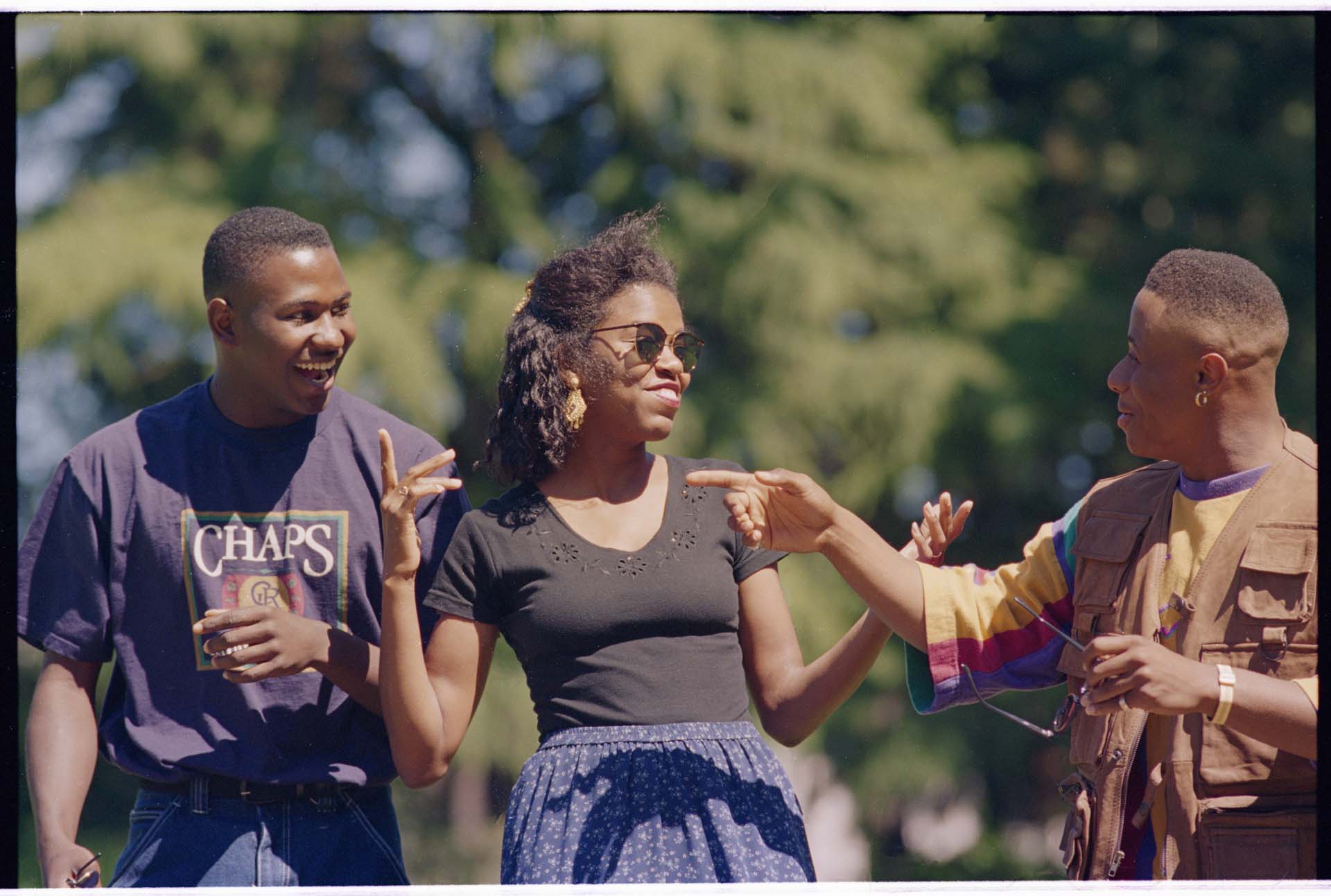 Image of Three people at Juneteenth celebration at Volunteer Park, Seattle, June 19, 1994