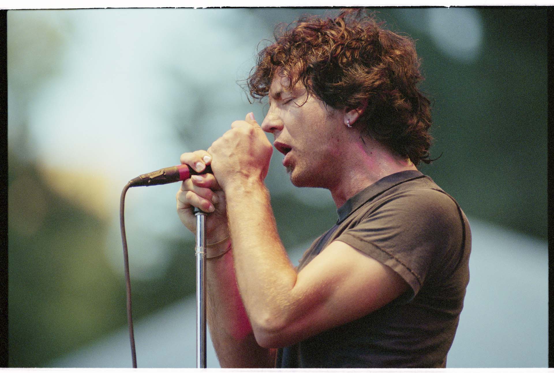 Image of Eddie Vedder performing at Memorial Stadium, Seattle, July 22, 1998