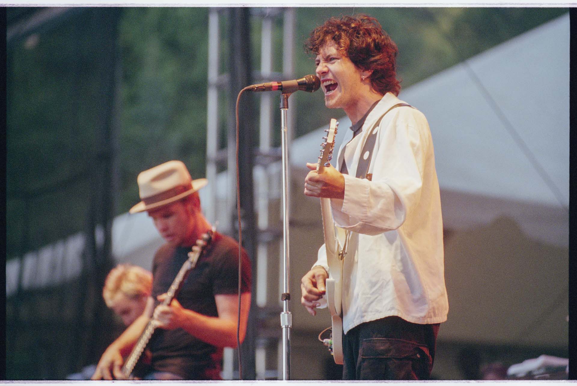 Image of Pearl Jam performing at Memorial Stadium, Seattle, July 22, 1998