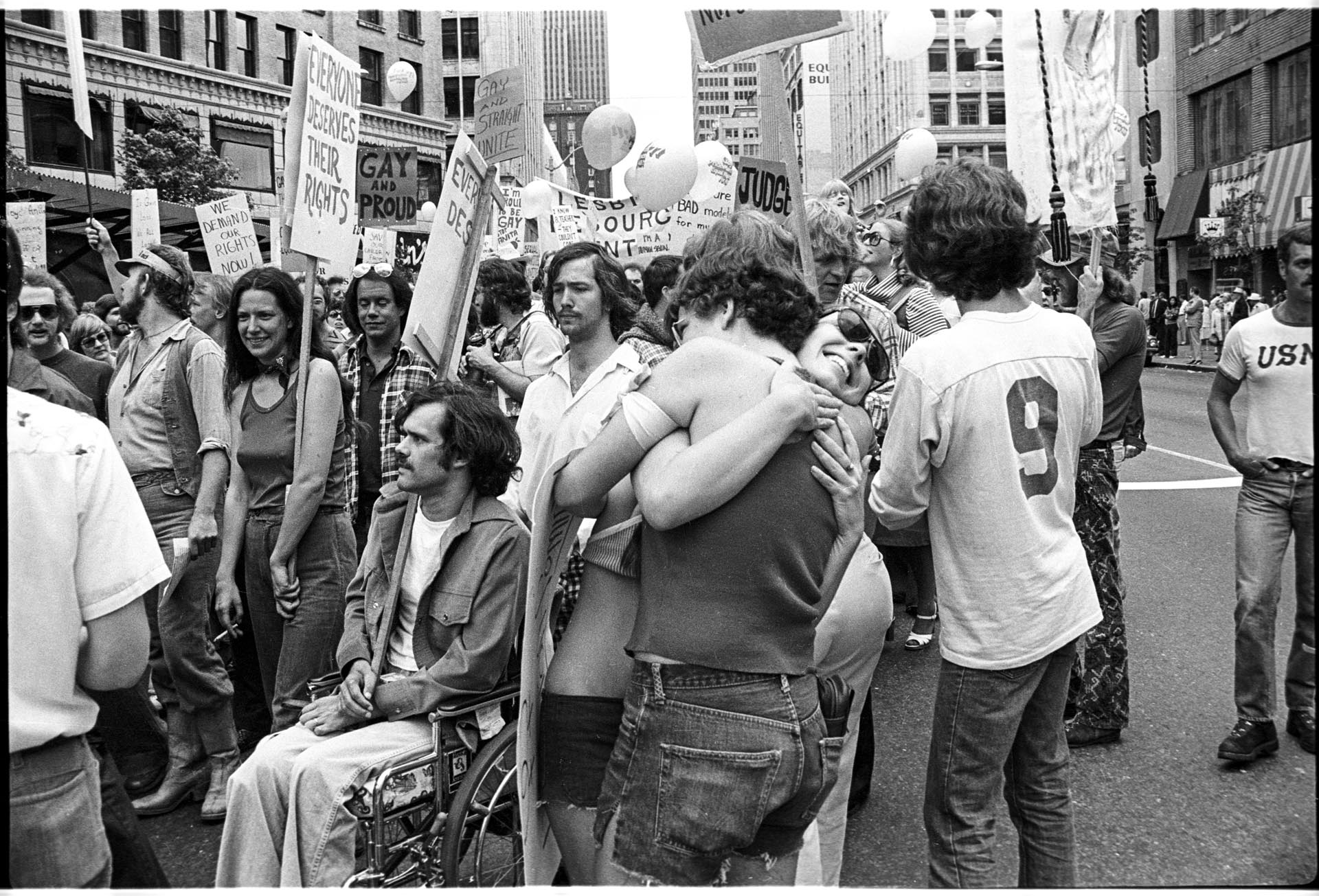 Image of Couple embracing at Gay Pride march, Seattle, June 25, 1977