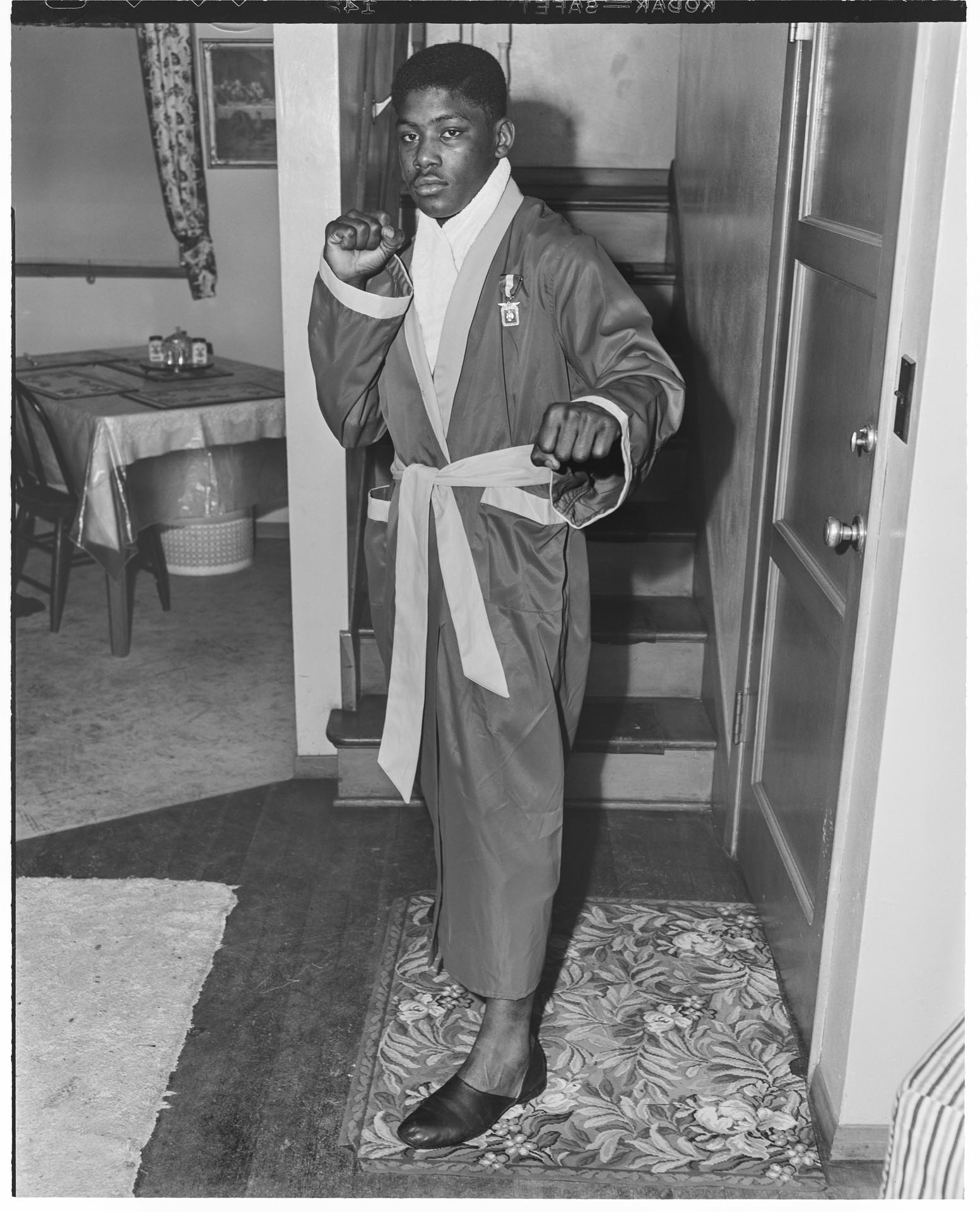 Image of Freddie Brown in his Golden Gloves Championship robe, Seattle, February 24, 1949