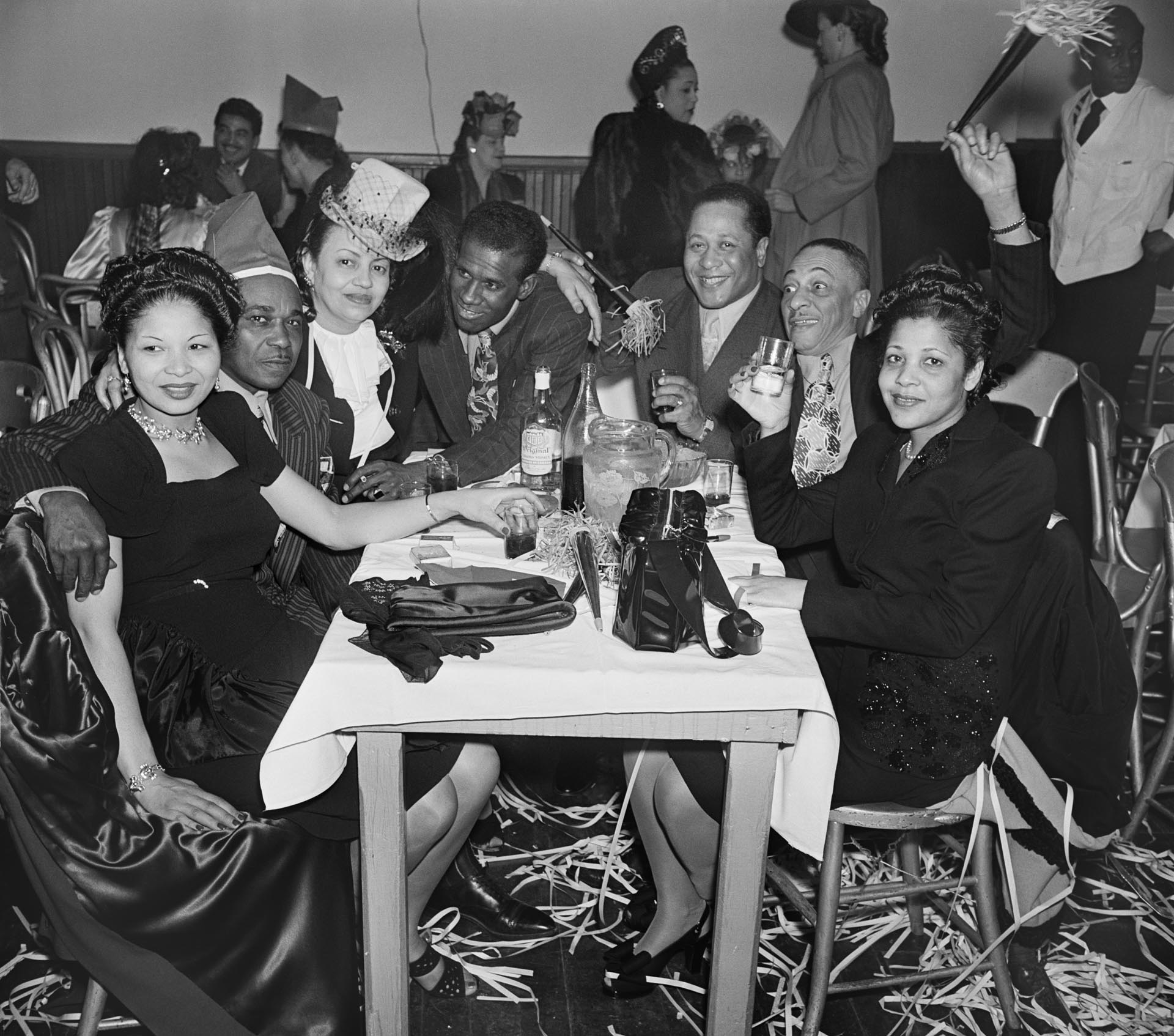 Image of Group around table at nightclub, Seattle, circa 1950