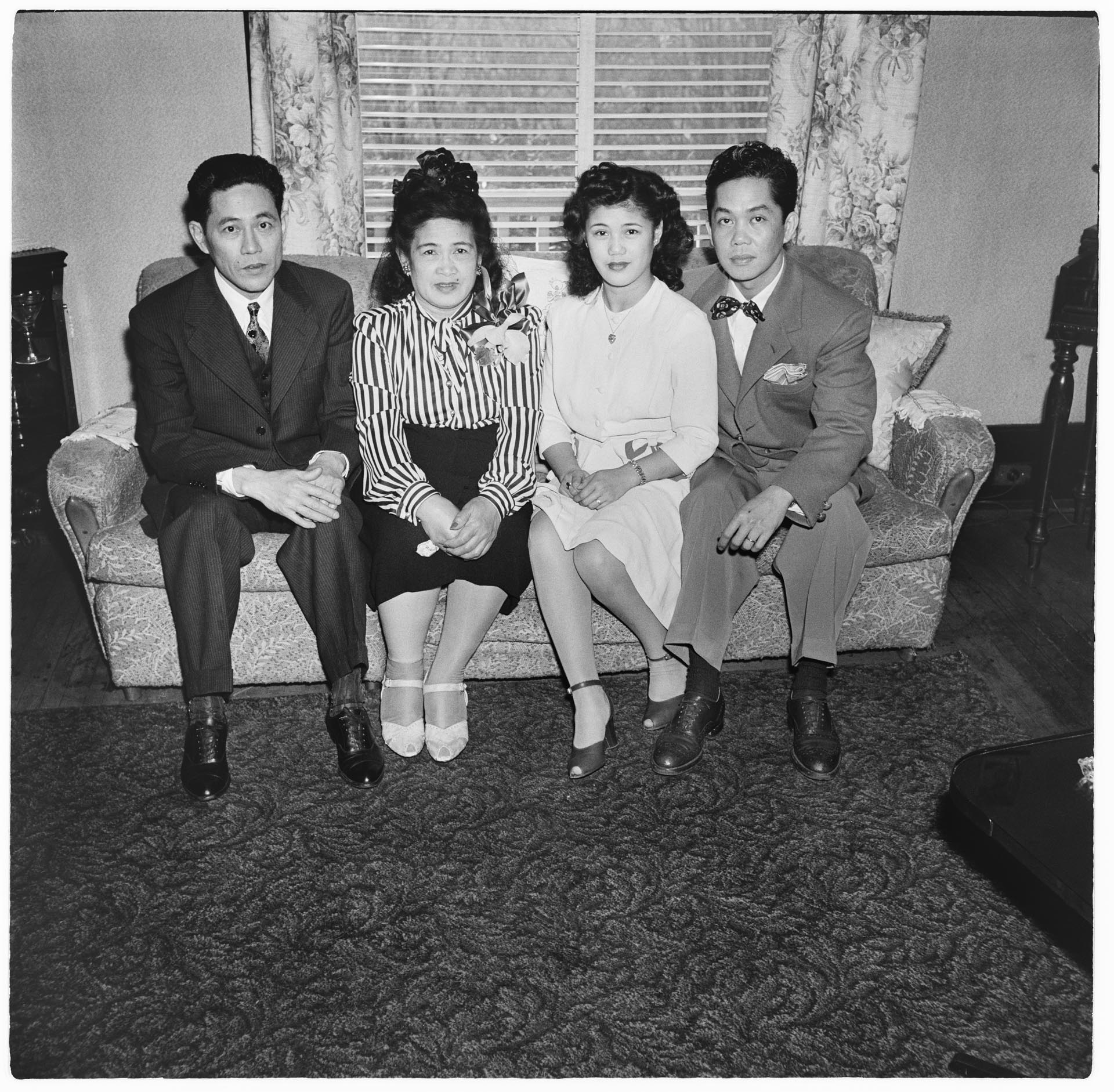 Image of Four people in a living room, Seattle, circa 1945