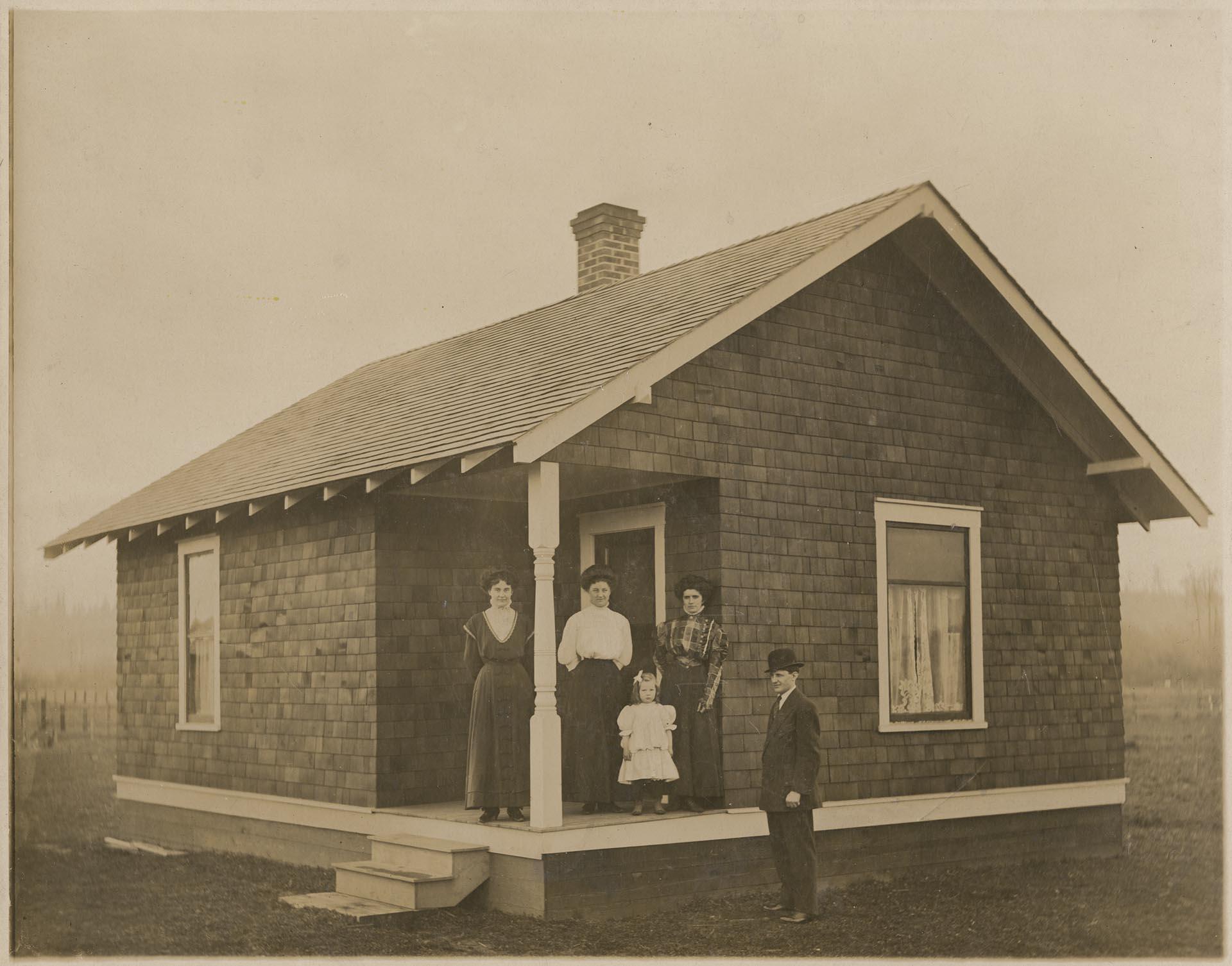 Image of Berg family in front of a house, Seattle, circa 1909