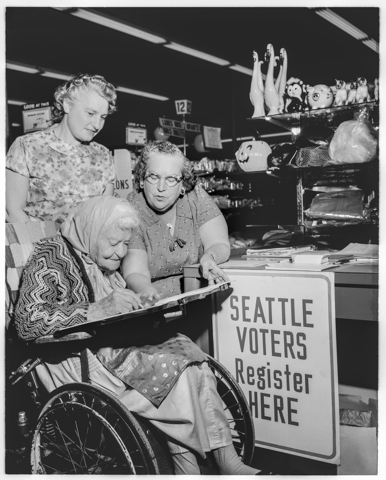 Image of Margaret Starkweather registering to vote, Seattle, September 26, 1964