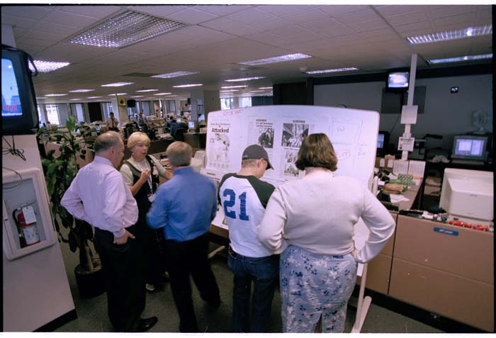 Image of PI staff working on special edition newspaper, September 11, 2001