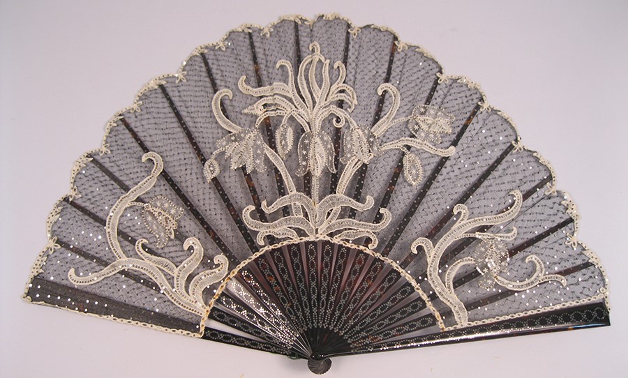 Image of Black net fan with design in white lace, ca. 1890-1910