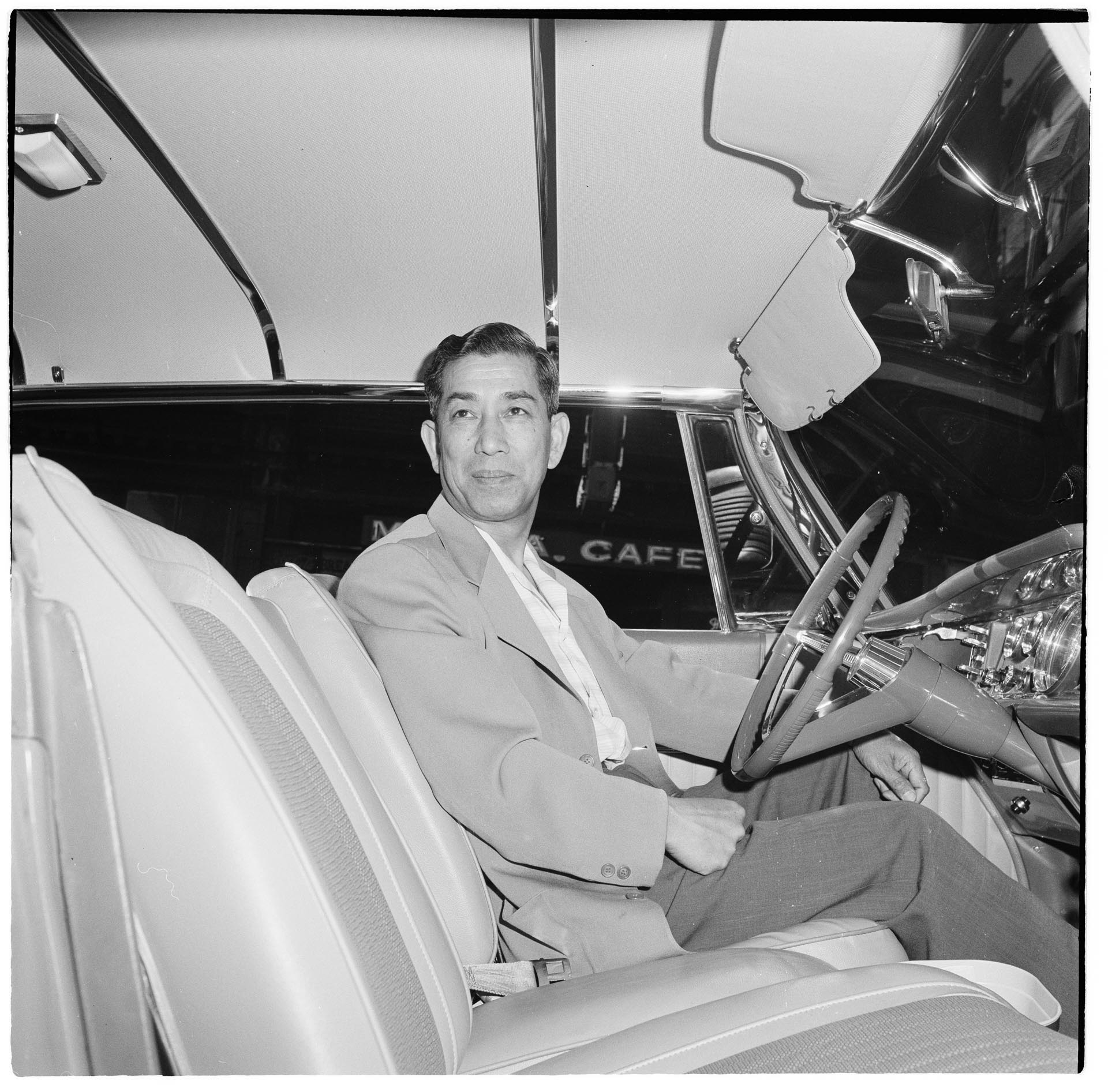 Image of Don Chin in his car, Seattle, July 1965