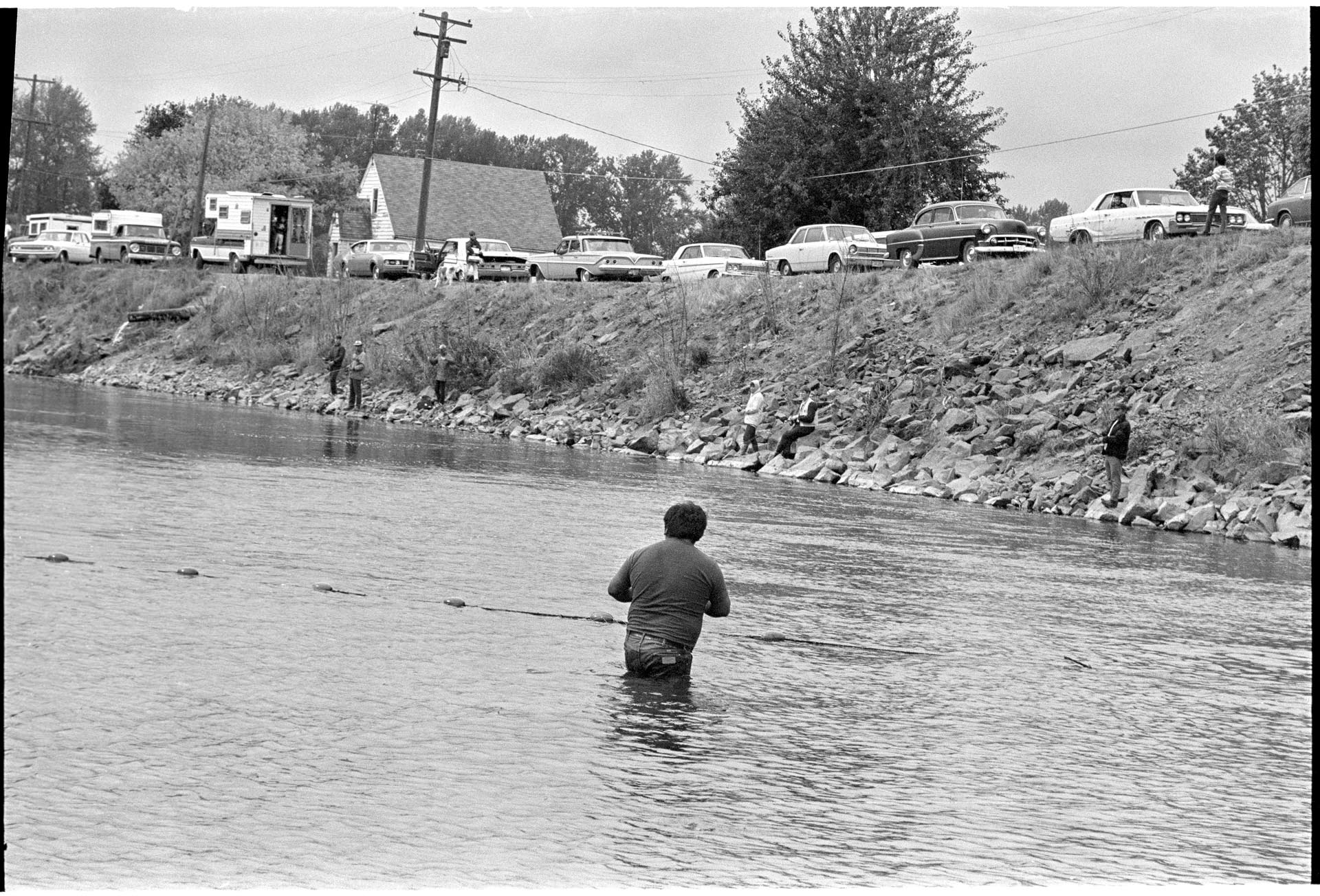 Image of Muckleshoot Tribe member practicing their fishing rights in Green River, Auburn, October 4, 1970
