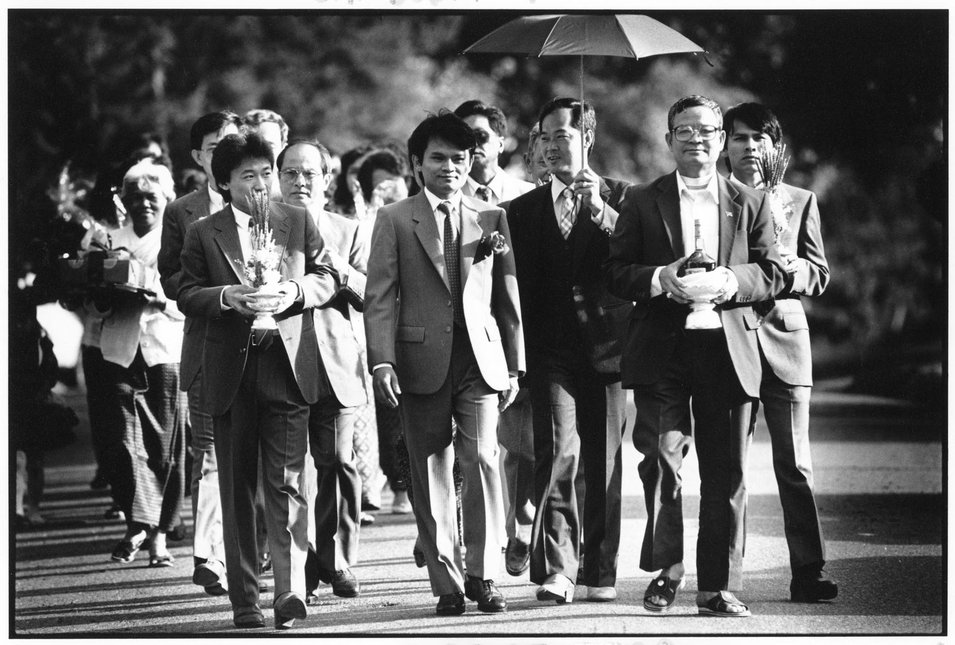 Image of Hin Chanrotha marching in procession at his wedding, Seattle, June 30, 1989
