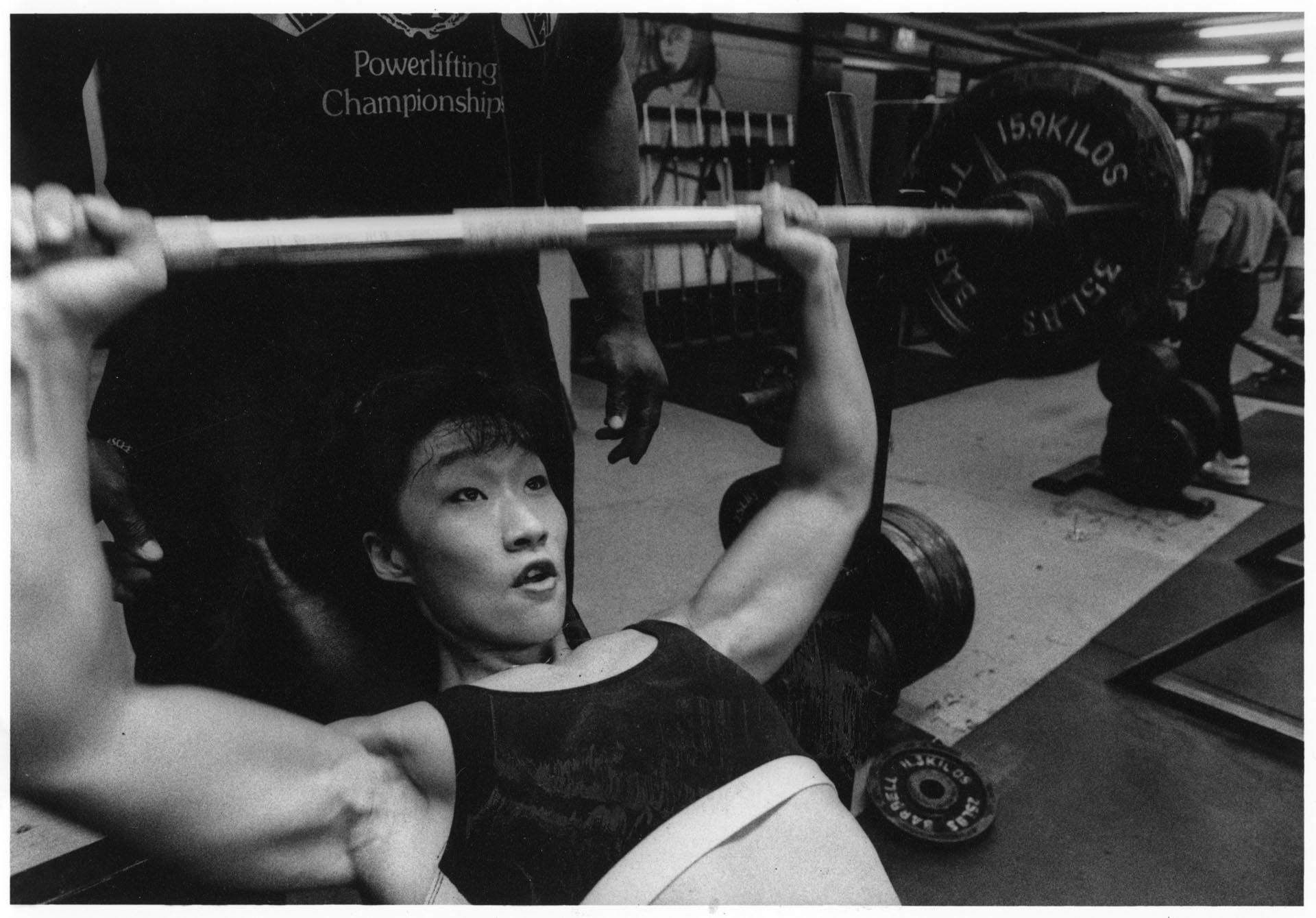 Image of Yueh-Chun Chang lifting weights, June 29, 1993