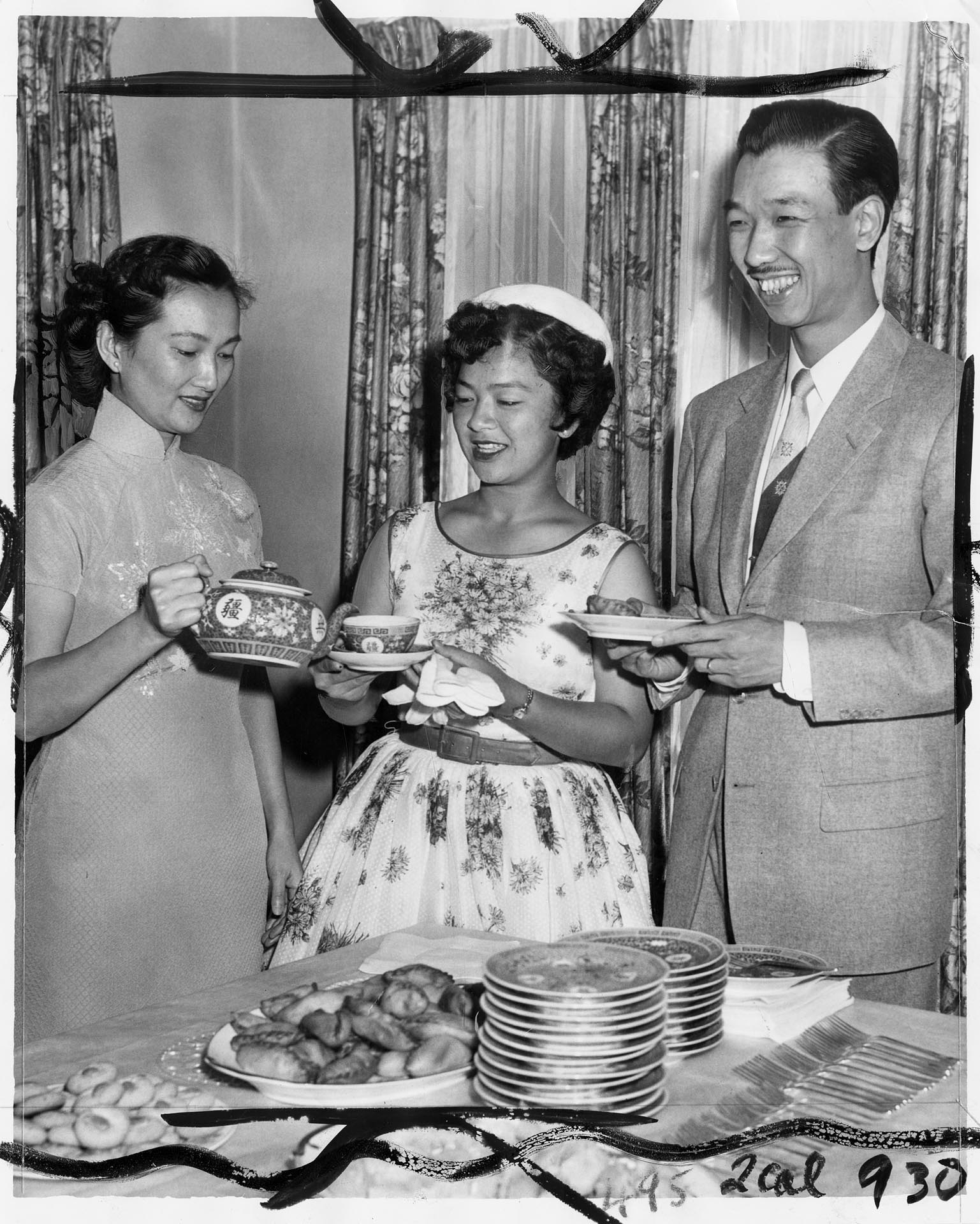Image of Chinese Seafair queen drinks tea with Chinese Consul General, Seattle, August 5, 1955