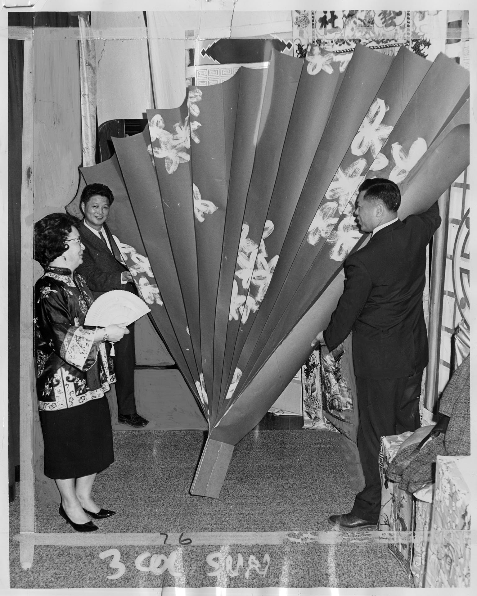 Image of Group setting up decorations at Chong Wa Benevolent Society Hall, Seattle, April 11, 1964