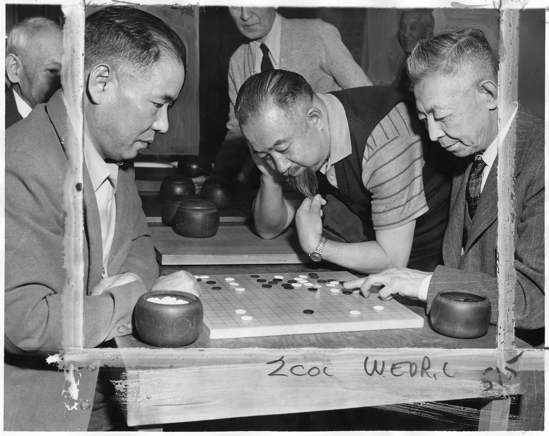 Image of Clarence Arai watching a game of Go at the Japanese Ki-in clubroom, Seattle March 6, 1957