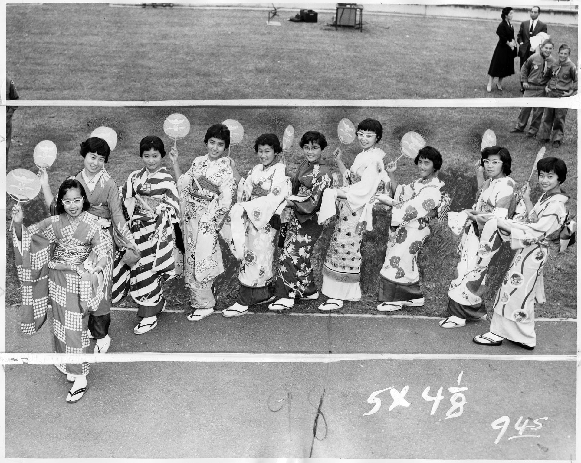 Image of Ten girls performing Bon Odori dance at Children's International Play Fair, Seattle, August 27, 1958