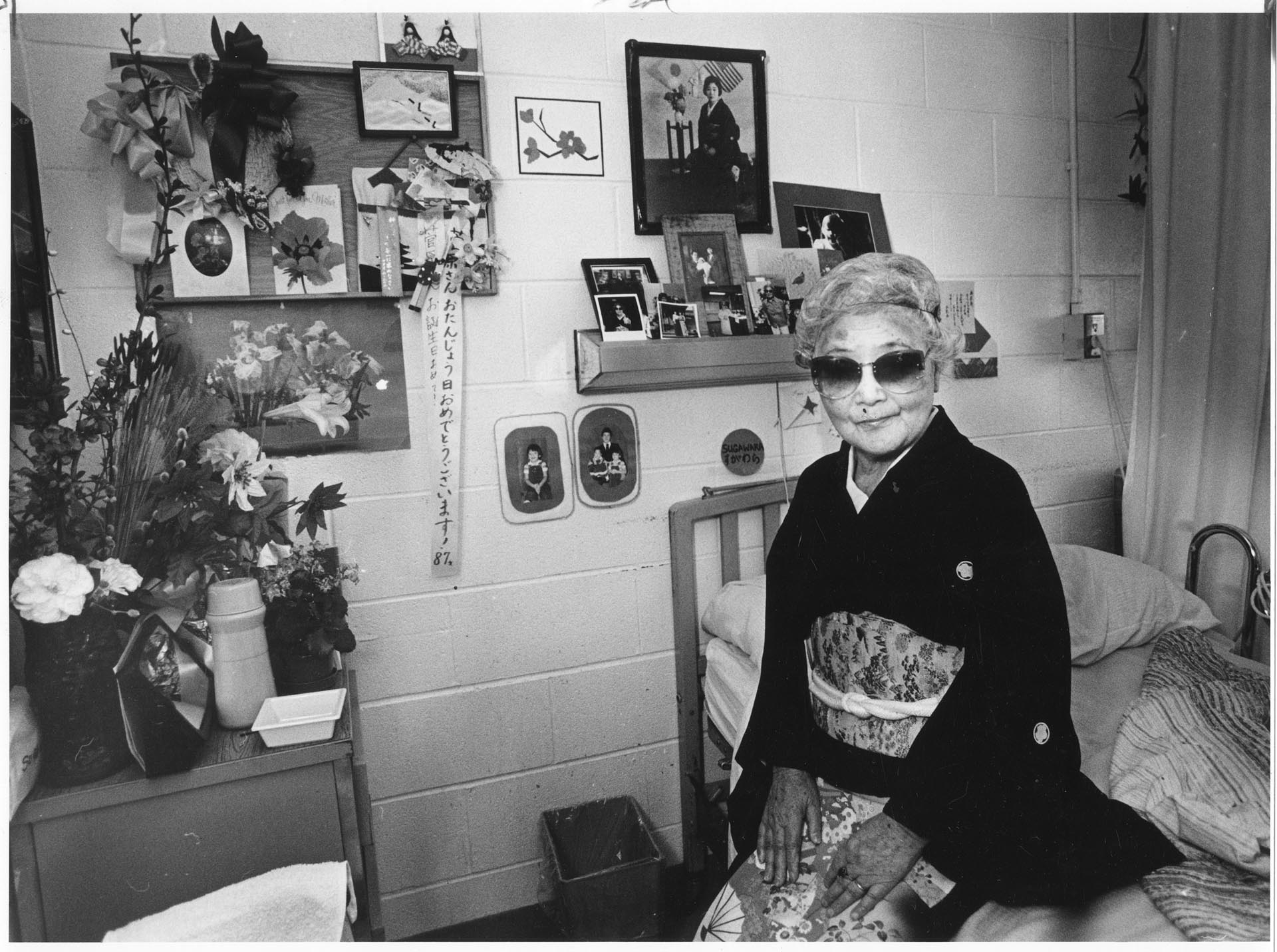 Image of Midori Sugawara in her room at Keiro Nursing Home, Seattle, April 16, 1985