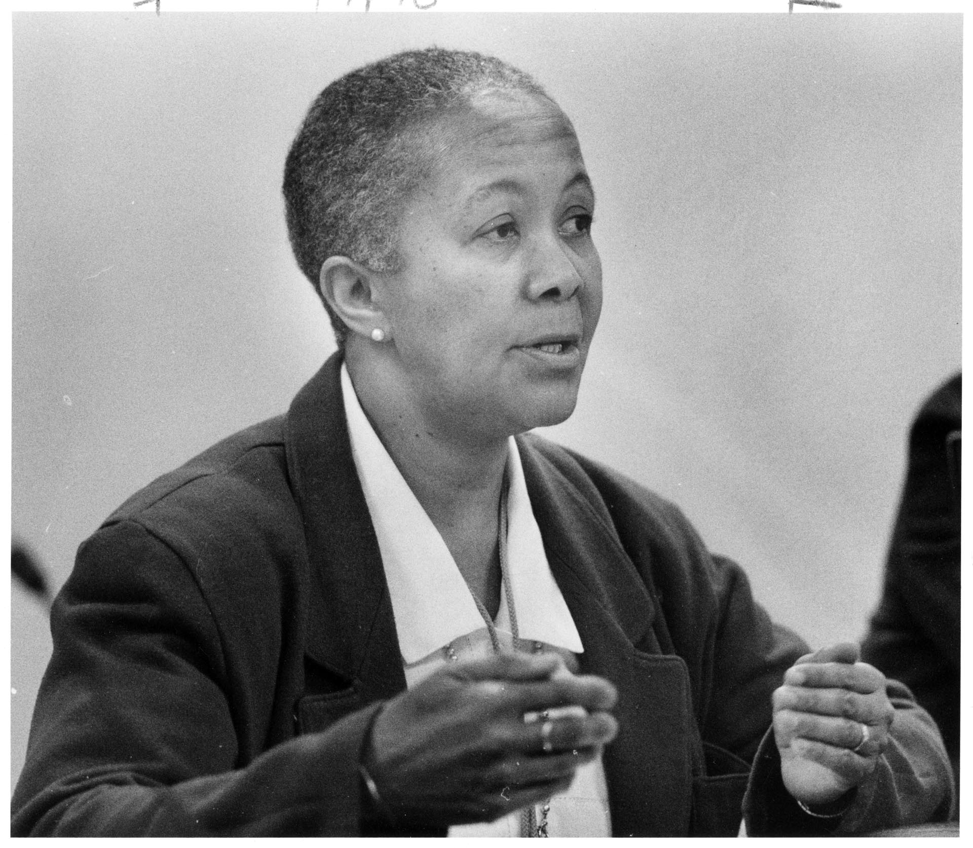 Image of Millie Russell speaking at hearing on discrimination in schools , February 18, 1986