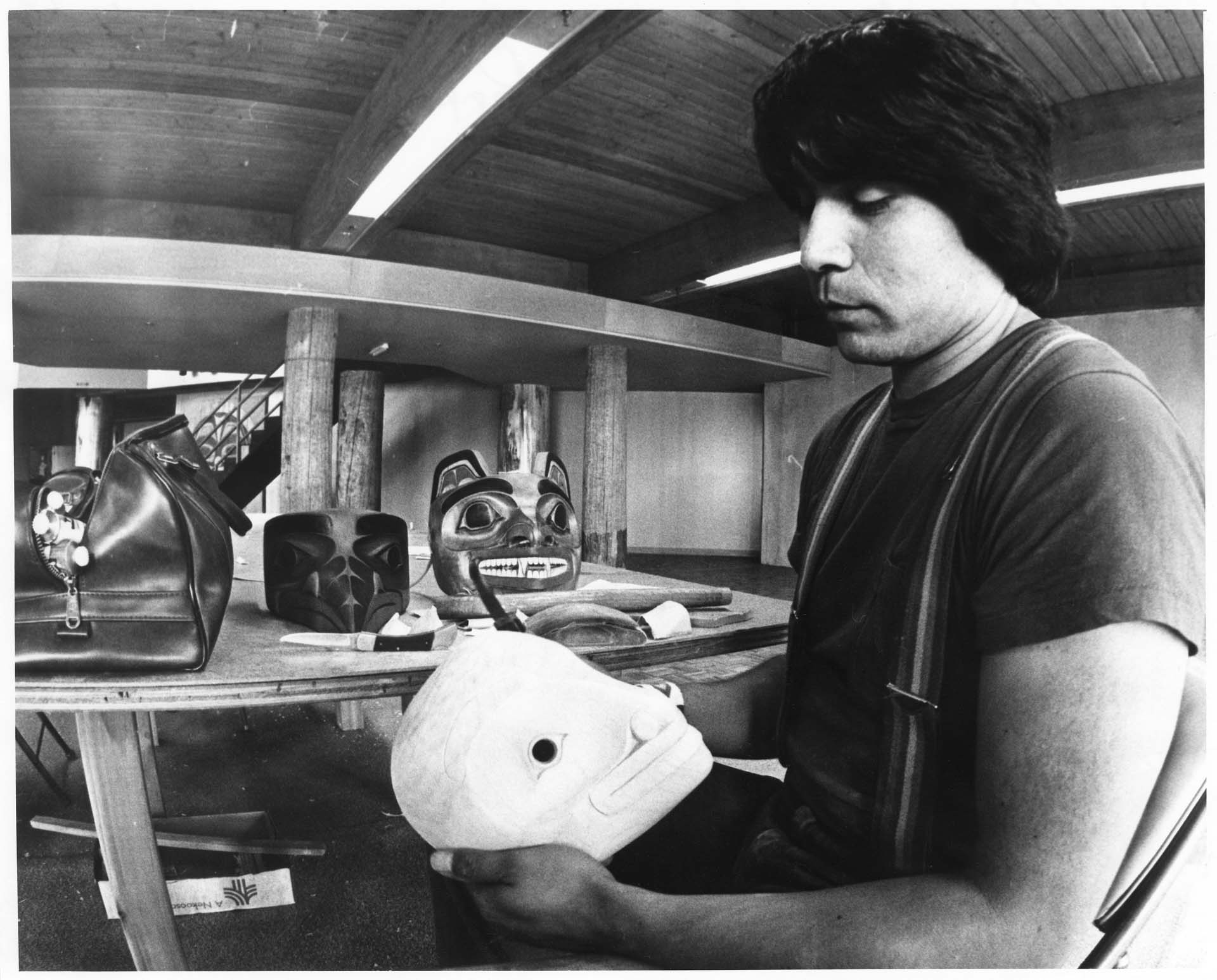 Image of Alex Williams carving mask at Daybreak Star Cultural Center, Seattle, April 13, 1978