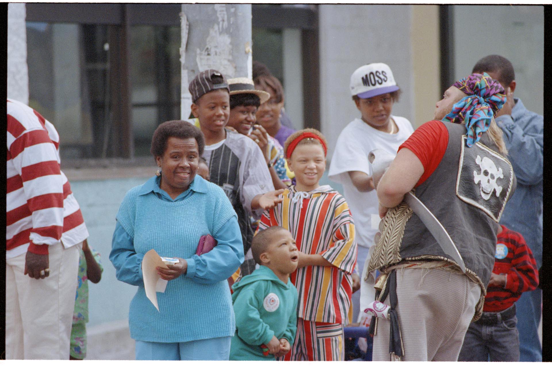 Image of Seafair pirate talking to spectators at Mardi Gras parade, July 25, 1993