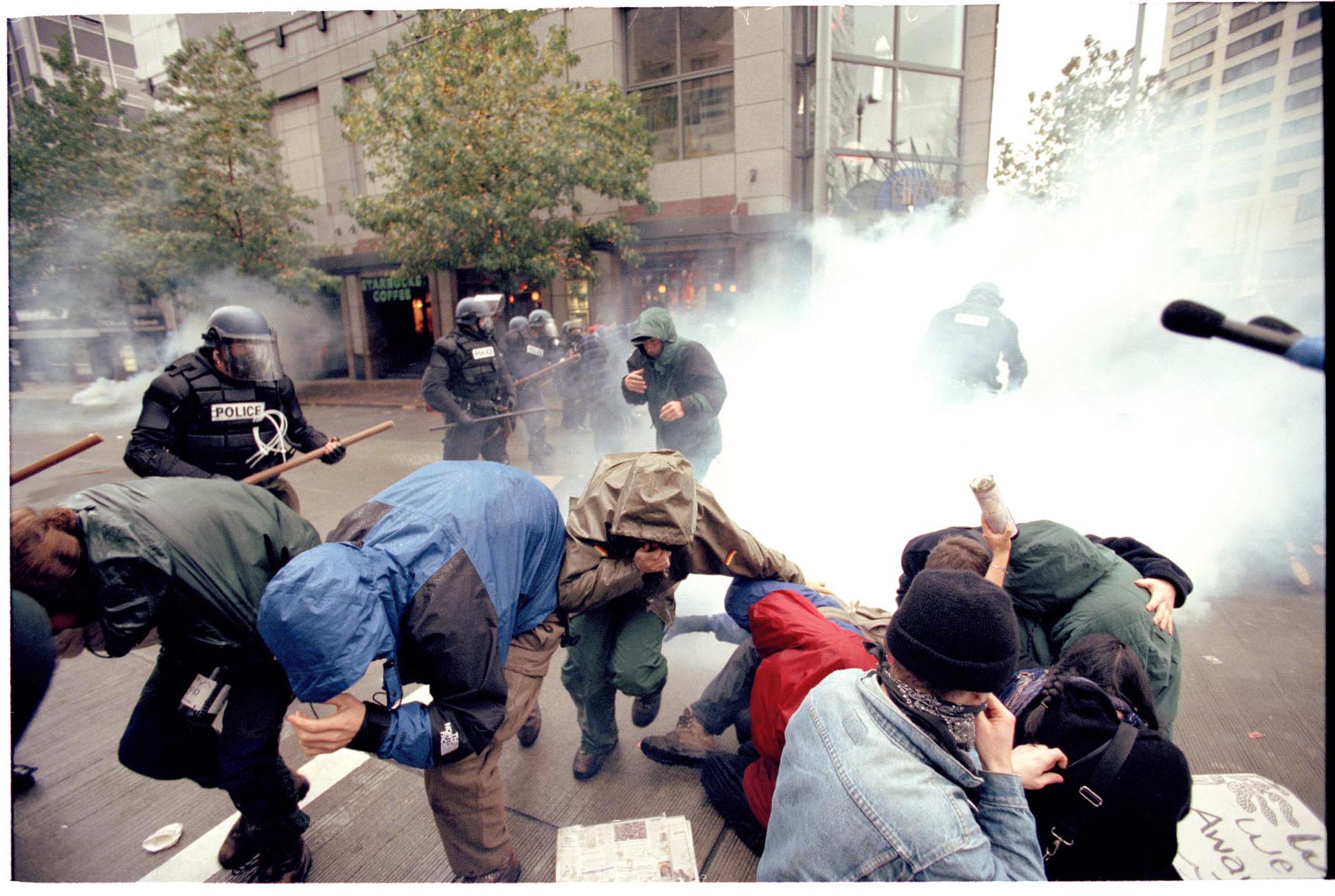 Image of Protesters reacting to tear gas attack at WTO protest, Seattle, November 30, 1999