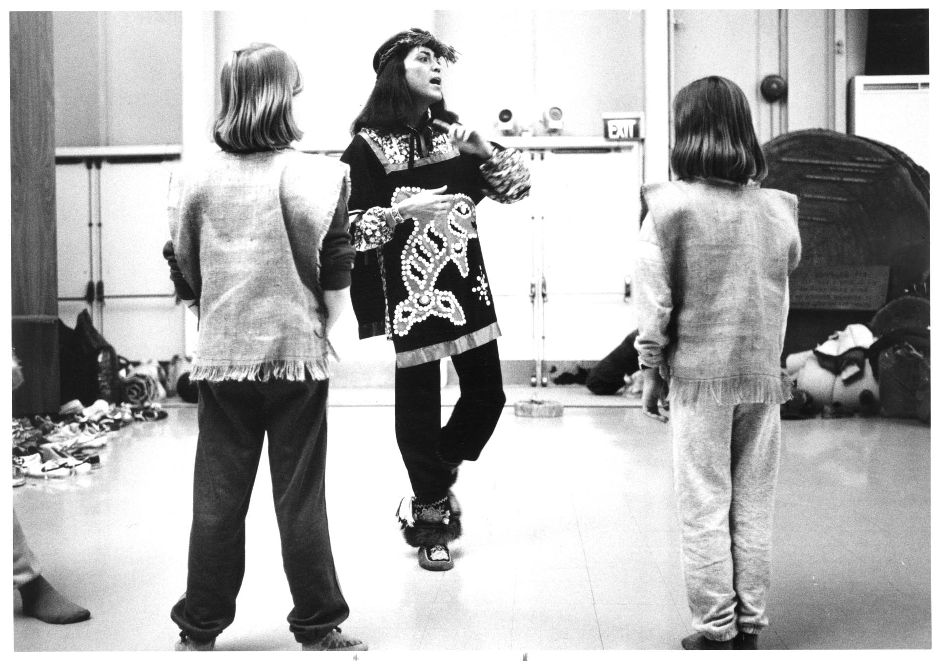 Image of Terry Tafoya teaching a dance to students at the Pacific Science Center, Seattle, March 2, 1983