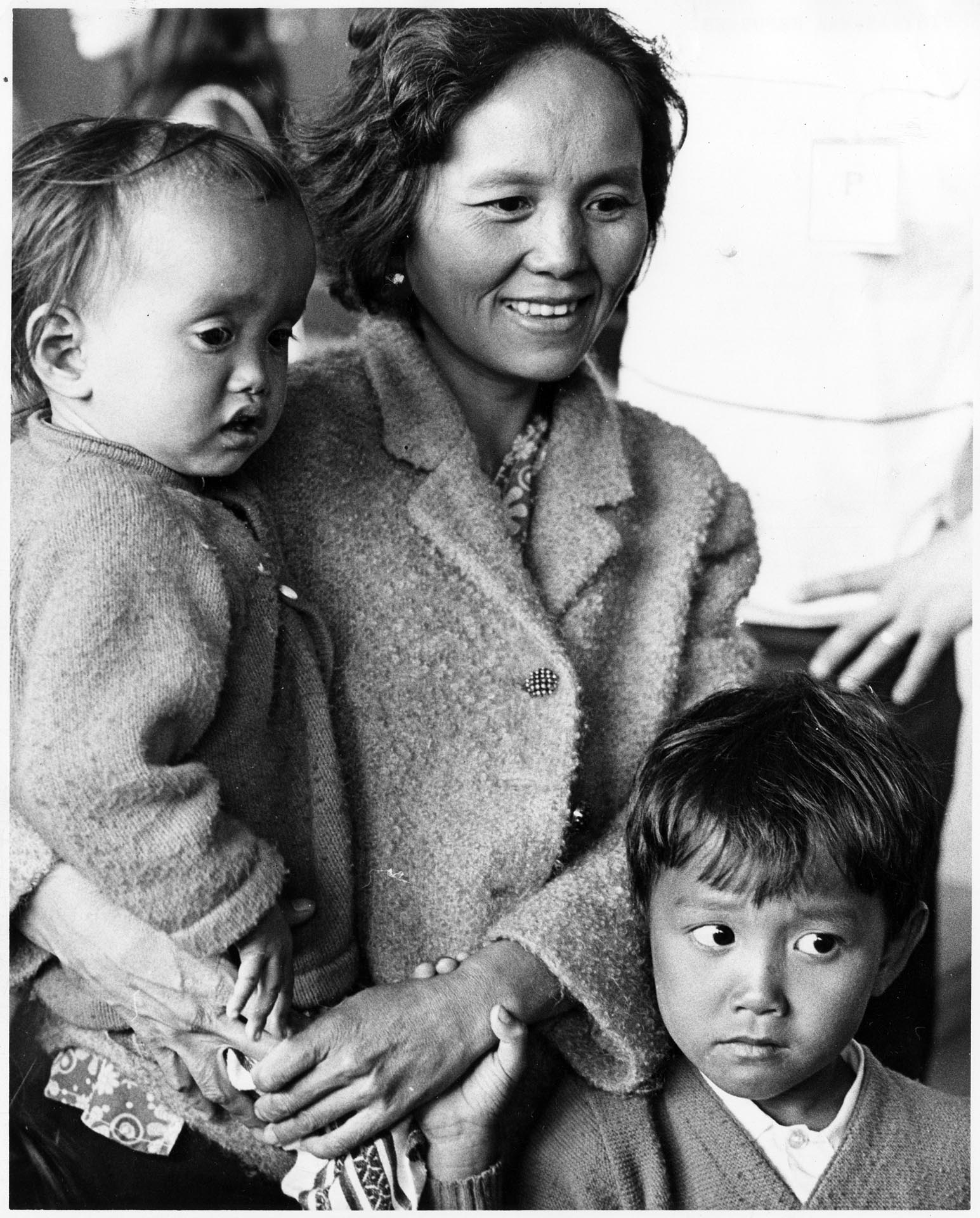 Image of Mrs. Nhon Ke Nguyễn and sons at Sea-Tac airport, May 20, 1975
