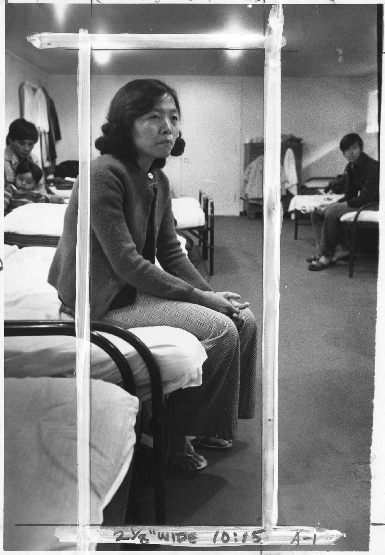 Image of Nguyen Thi Noi in barracks at Camp Murray, Washington, June 6, 1975
