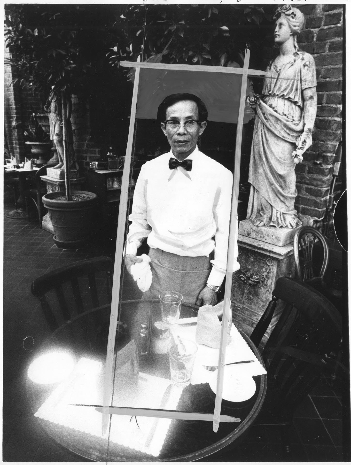 Image of Thui Dinh Bui waiting tables at City Loan Pavilion, February 19, 1976