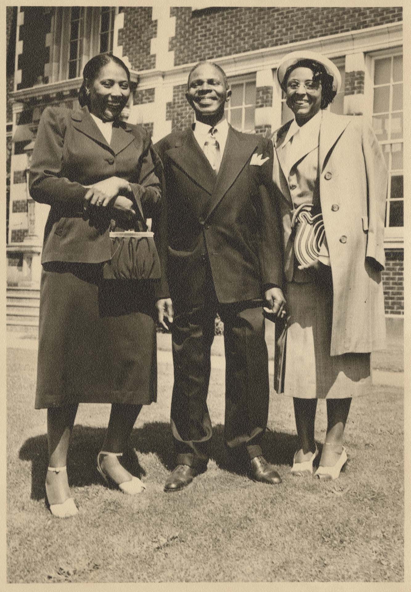 Image of Mr. and Mrs. Harrison and another woman at Garfield High School, May 7, 1950