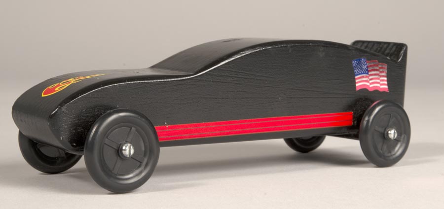 Image of Black and sporty pinewood derby car, one of four, made by Jim Smith, ca. 1995-2010
