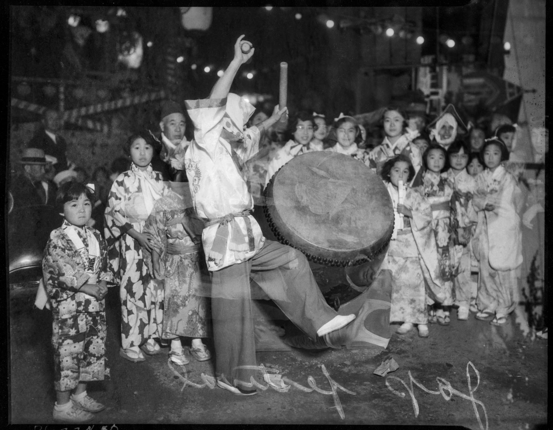 Image of Taiko drummer and children at Bon Odori festival, Seattle, 1935