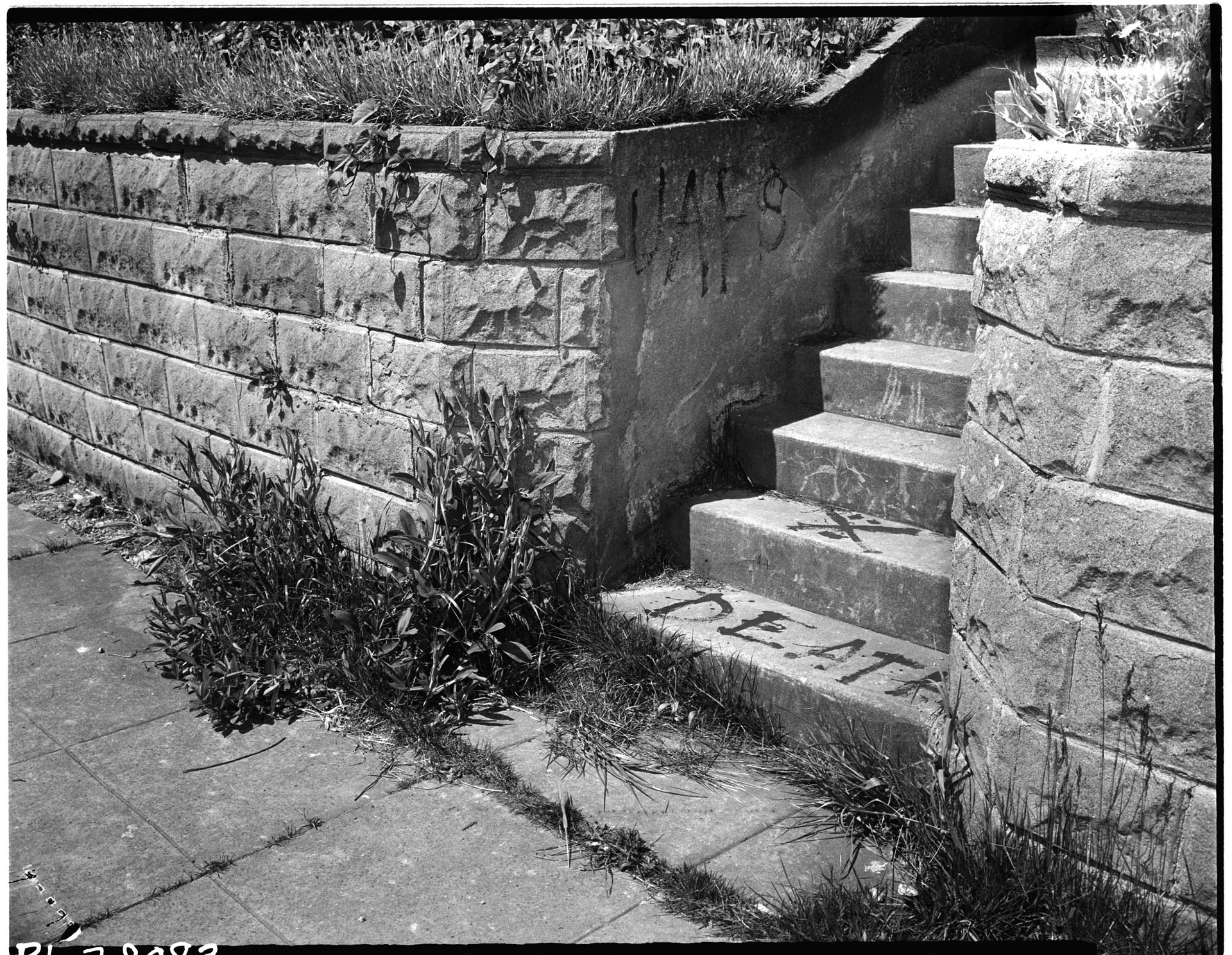 Image of Racist graffiti in front of Japanese American home, Seattle, May 11, 1945