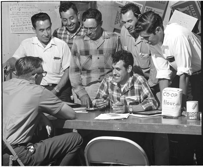 Image of Tomas Villanueva with Co-op members at the United Farm Workers Cooperative, Toppenish, Washington, July 1967