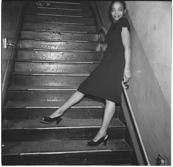 Image of Woman on stairs at Basin Street nightclub, circa 1944