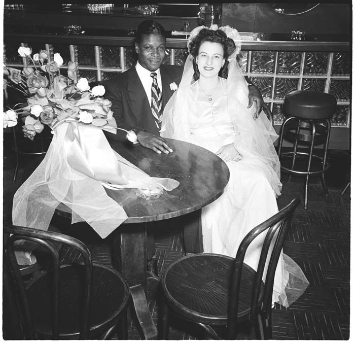 Image of Newlywed couple at the Black & Tan nightclub, 1945