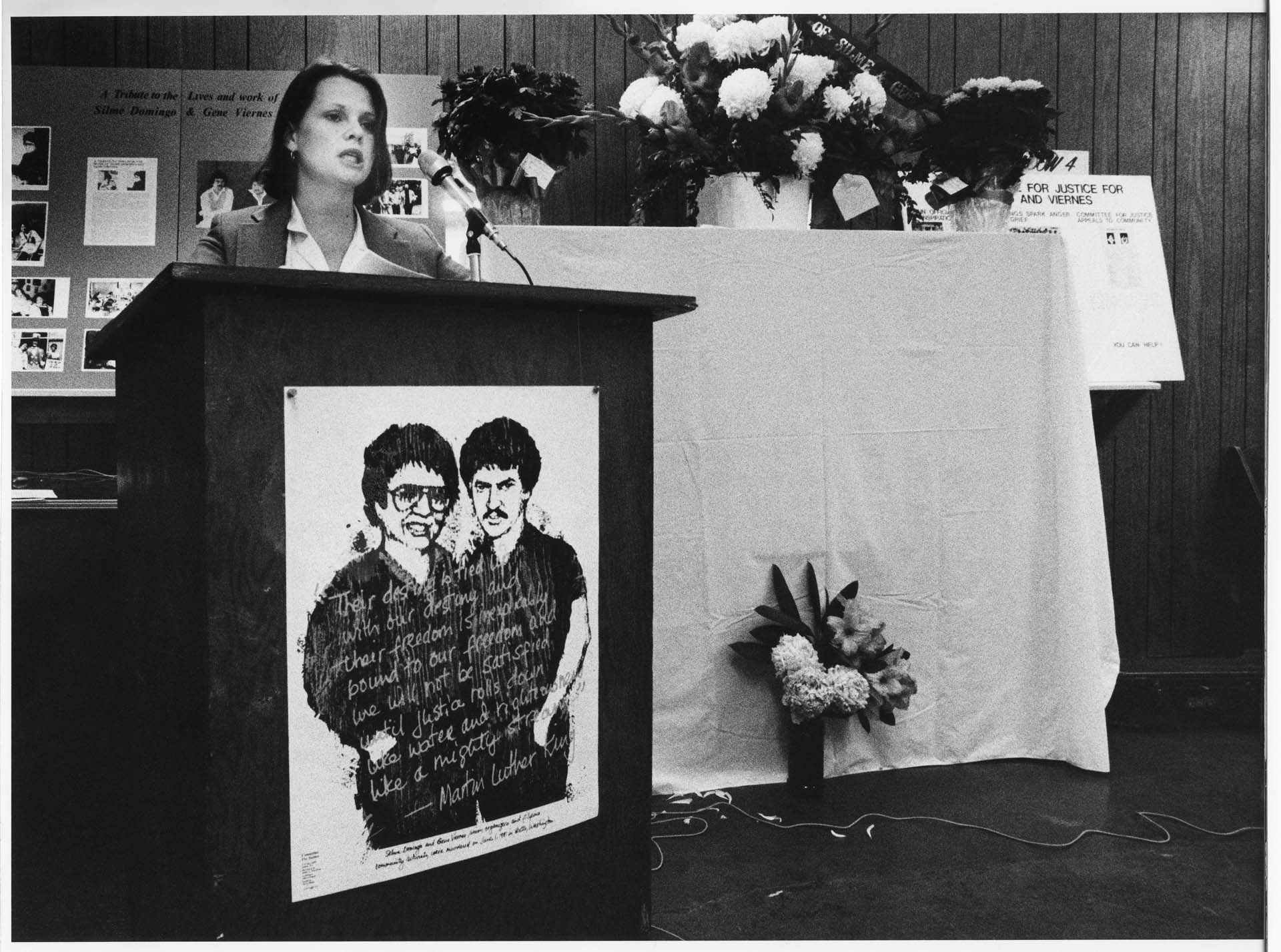 Image of Terri Mast speaking at memorial service for Silme Domingo and Gene Viernes, Seattle, June 1982