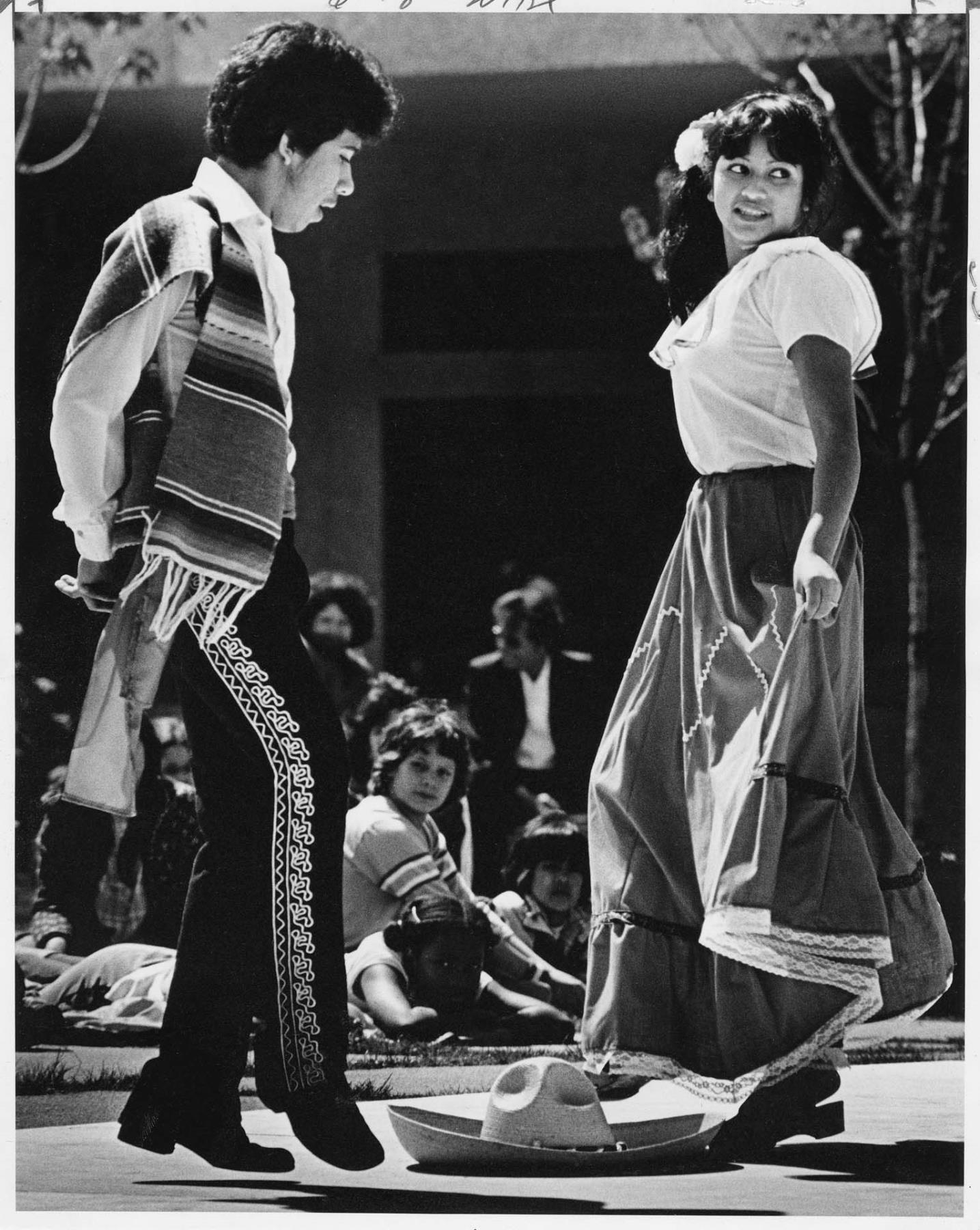 Image of Cesar Cardona and Margo Ramirez dancing during Cinco de Mayo celebration, Seattle, May 5, 1981