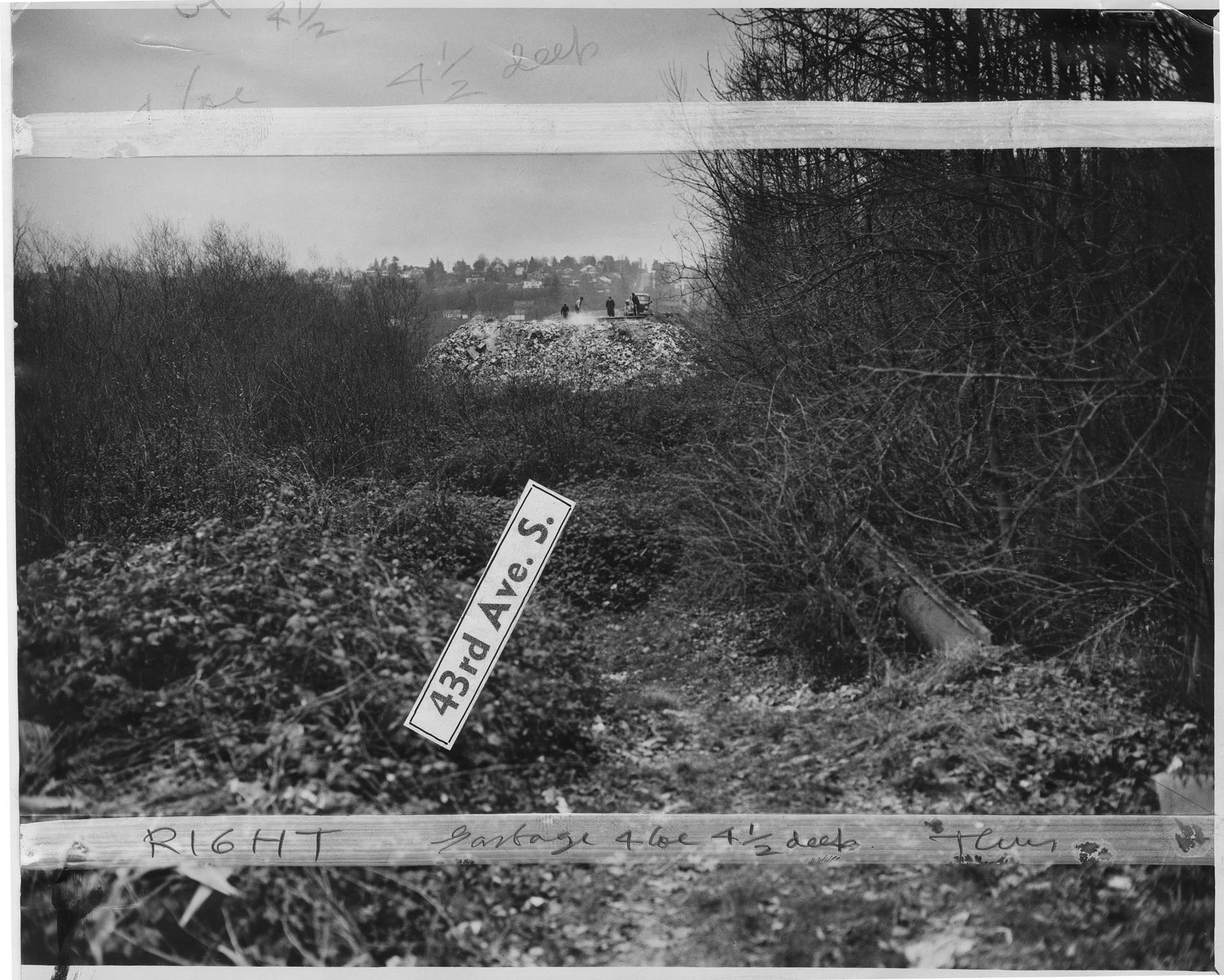 Image of View of sanitary landfill on 43rd. Ave. S. looking south, Seattle, December 1942
